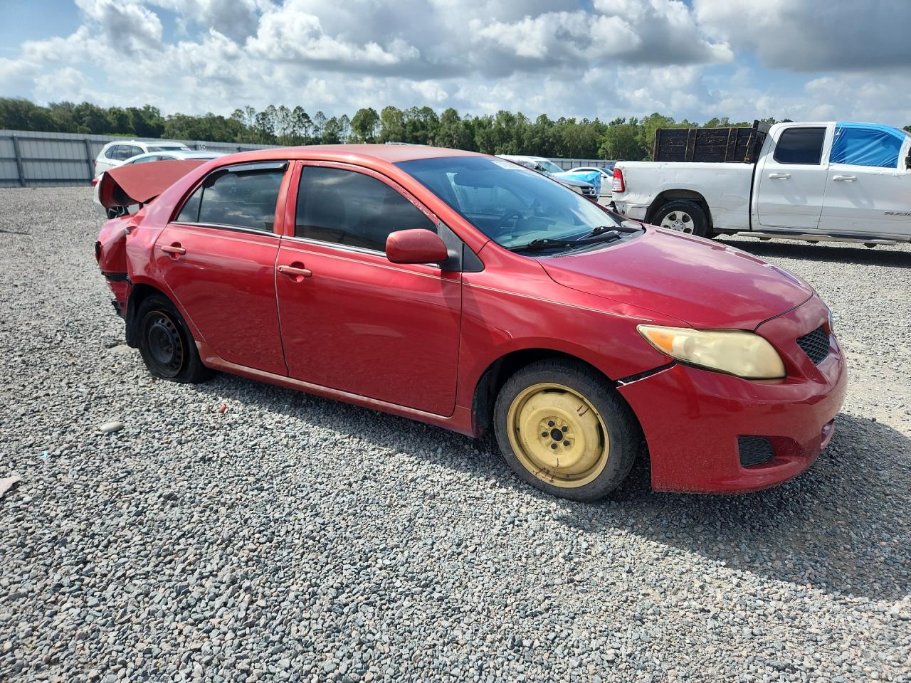 2009 Toyota Corolla Le Red vin: JTDBL40E79J032244