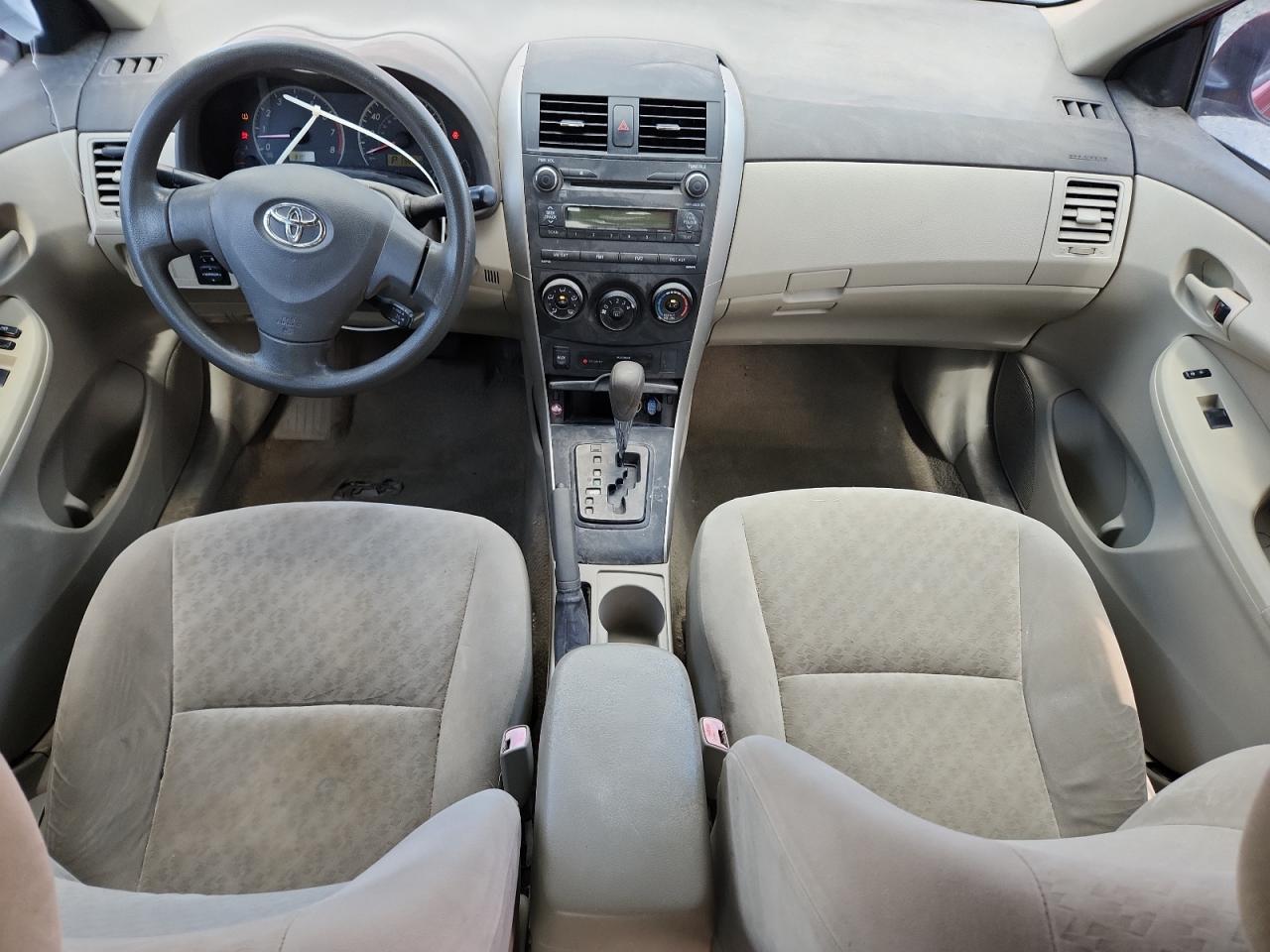 2009 Toyota Corolla Le Red vin: JTDBL40E79J032244