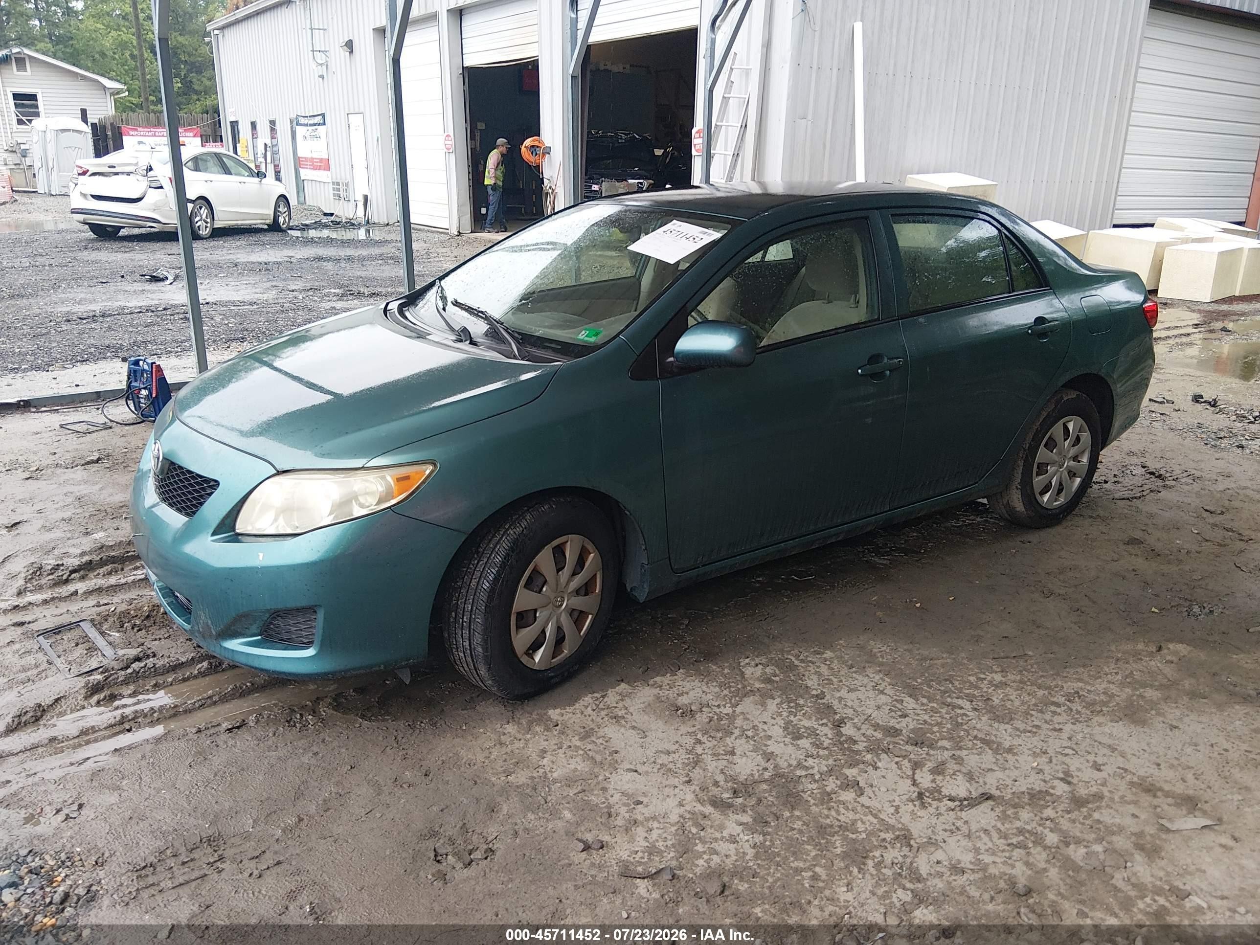 2009 Toyota Corolla Le Green vin: JTDBL40E79J044071