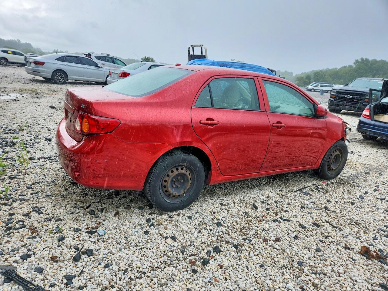 2009 Toyota Corolla Le Red vin: JTDBL40E79J047925