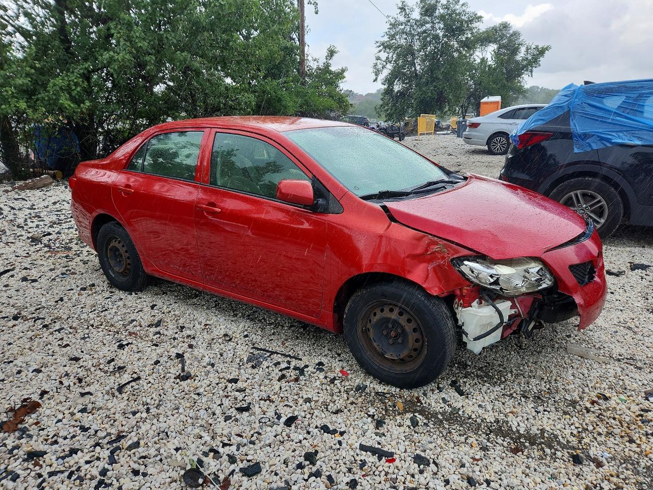 2009 Toyota Corolla Le Red vin: JTDBL40E79J047925