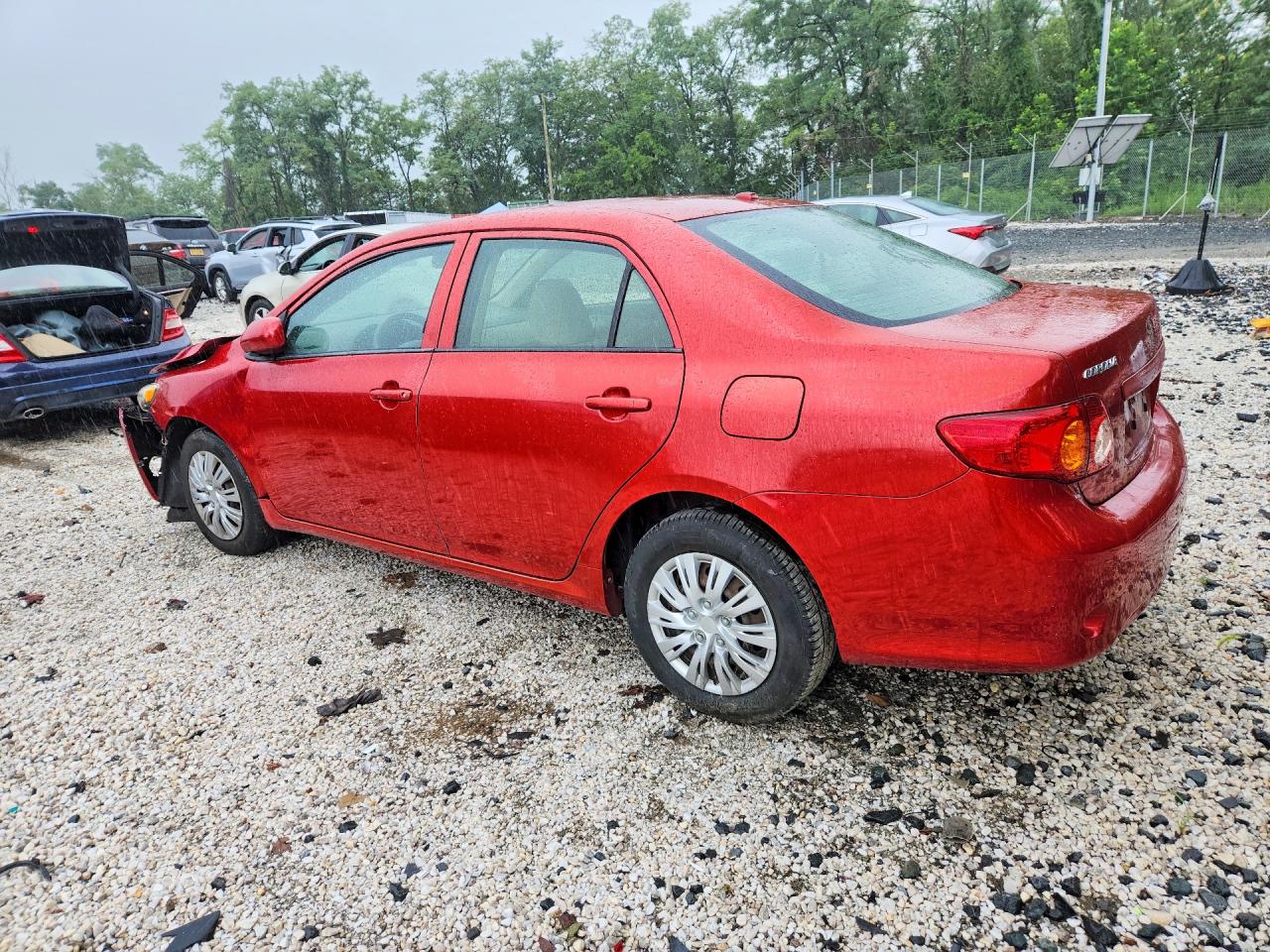 2009 Toyota Corolla Le Red vin: JTDBL40E79J047925