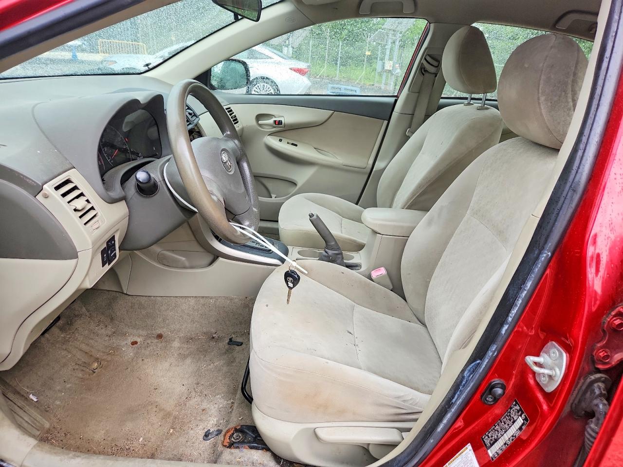 2009 Toyota Corolla Le Red vin: JTDBL40E79J047925