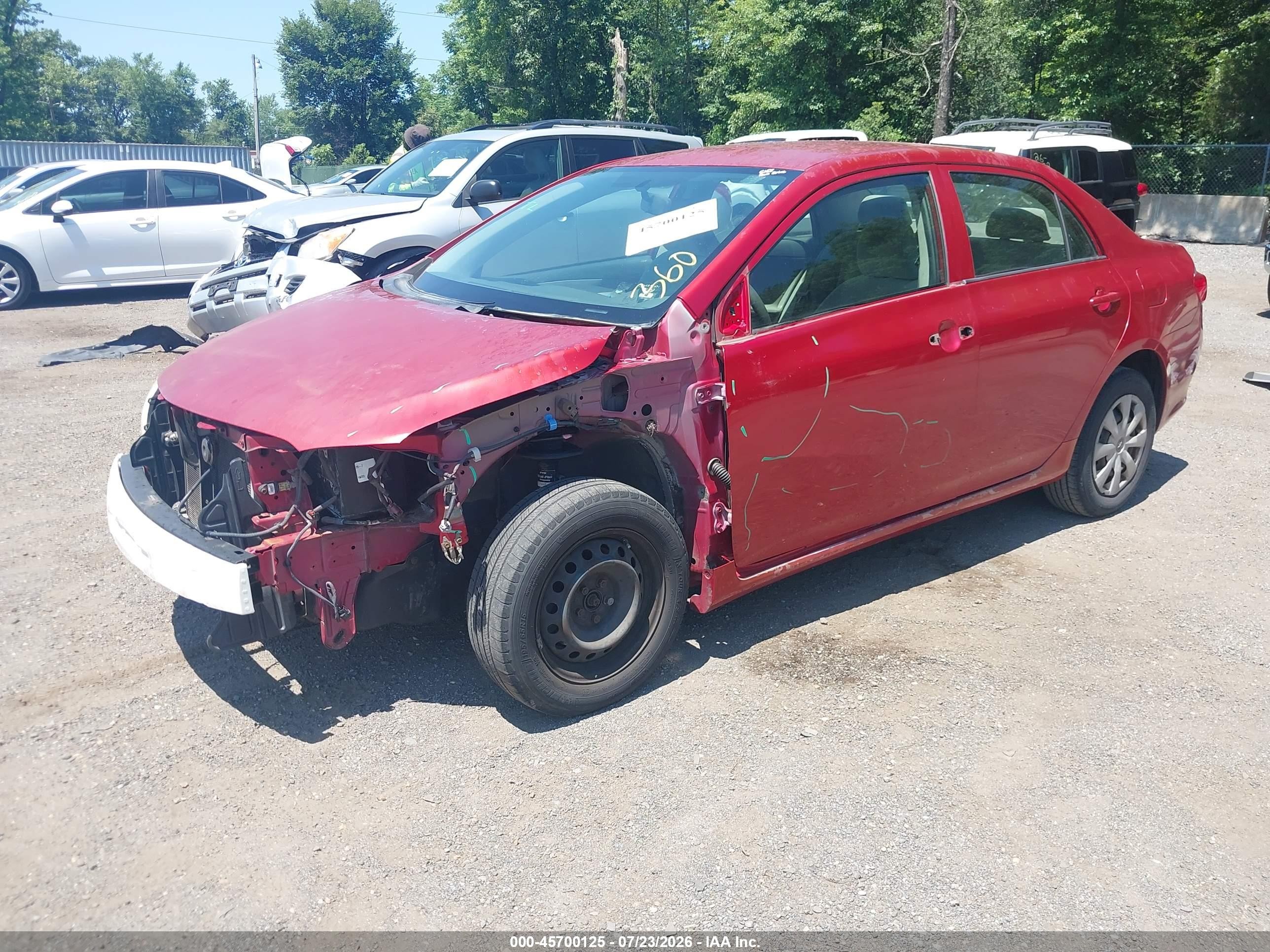 2009 Toyota Corolla Le Red vin: JTDBL40E899032142