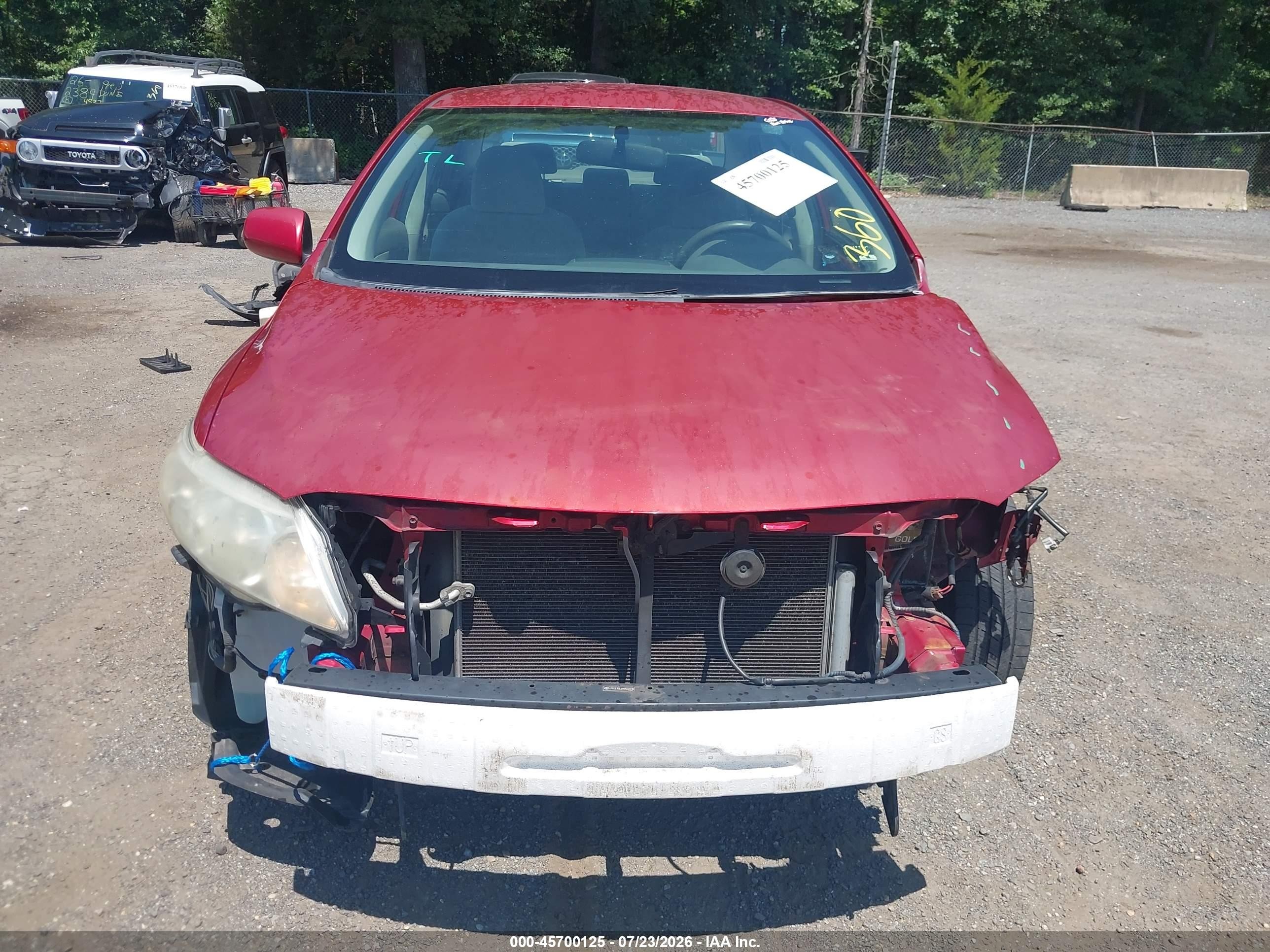 2009 Toyota Corolla Le Red vin: JTDBL40E899032142