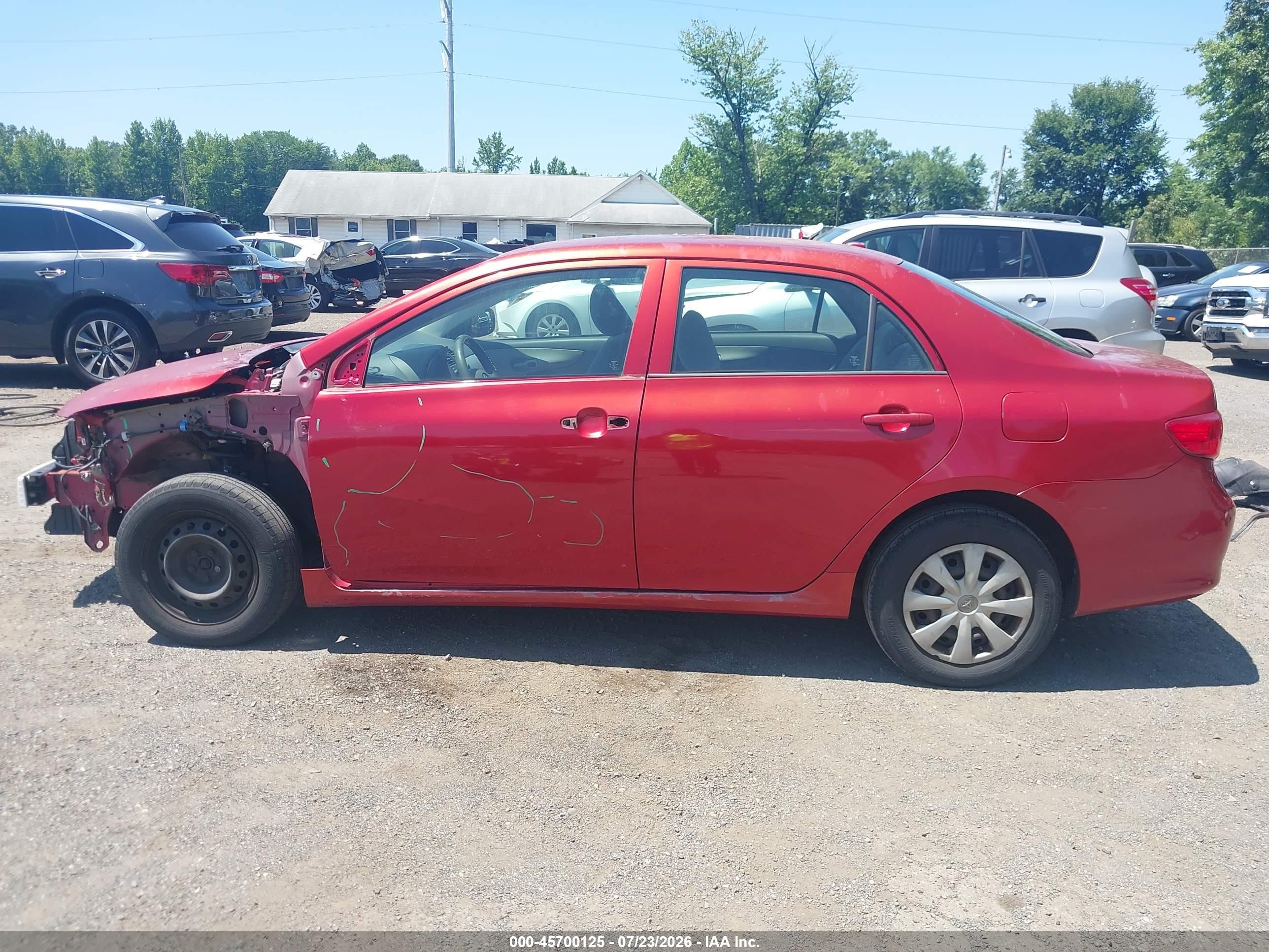 2009 Toyota Corolla Le Red vin: JTDBL40E899032142