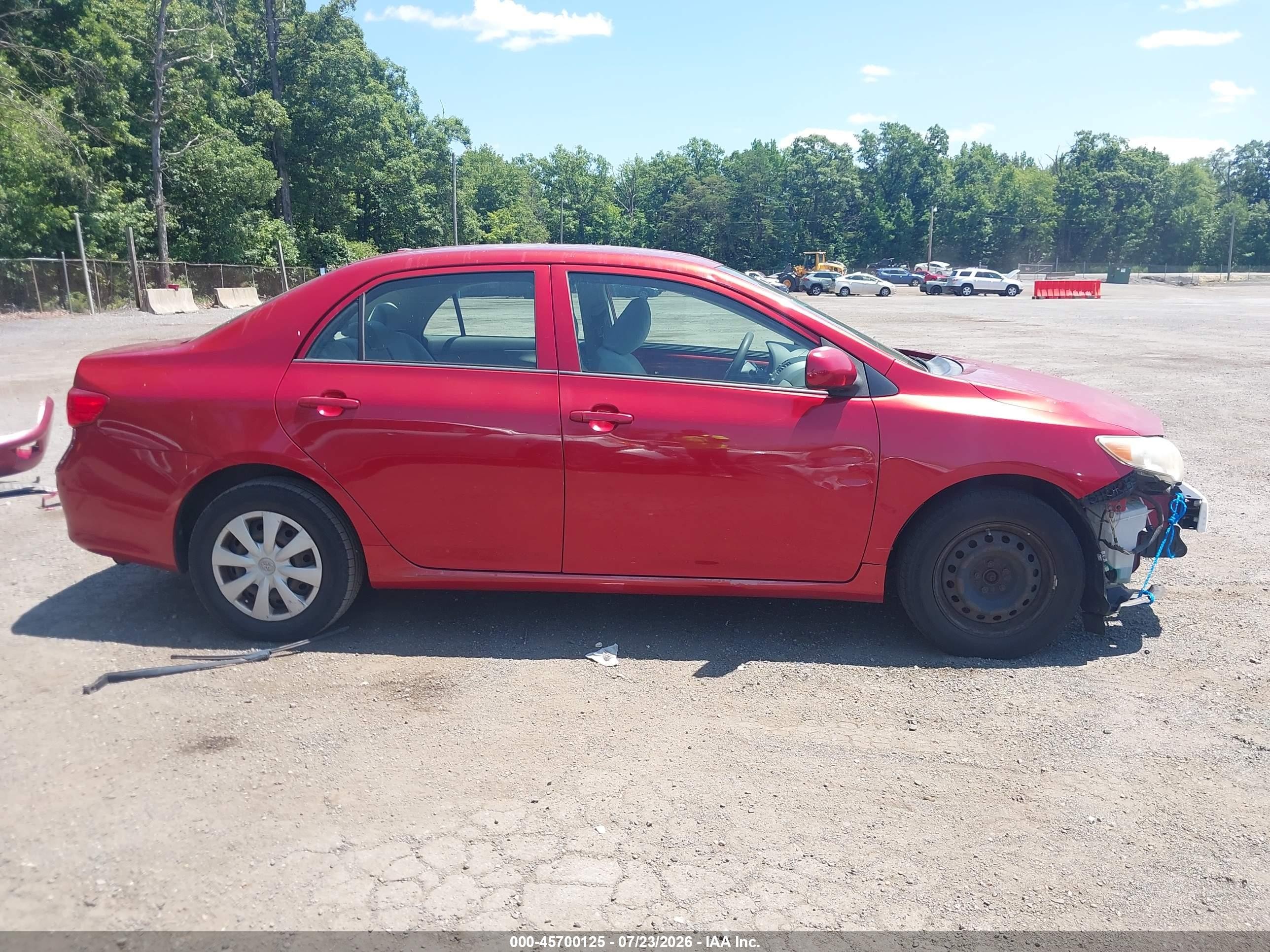 2009 Toyota Corolla Le Red vin: JTDBL40E899032142
