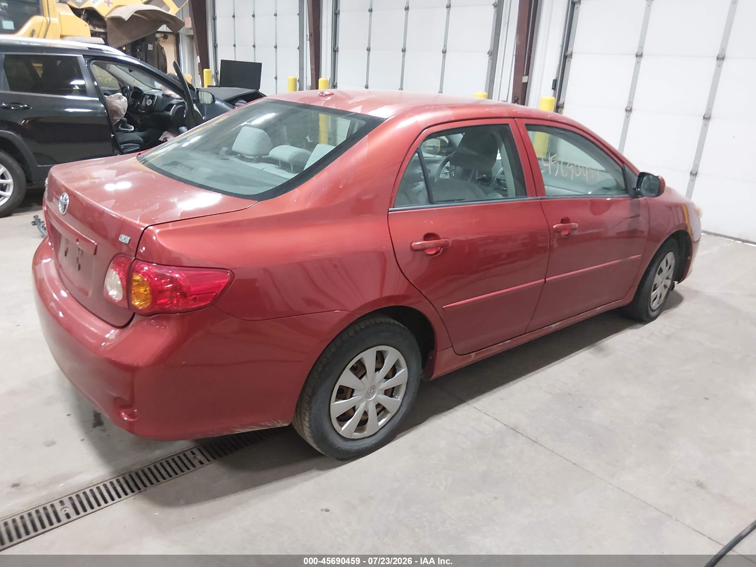 2009 Toyota Corolla Le Red vin: JTDBL40E899047174