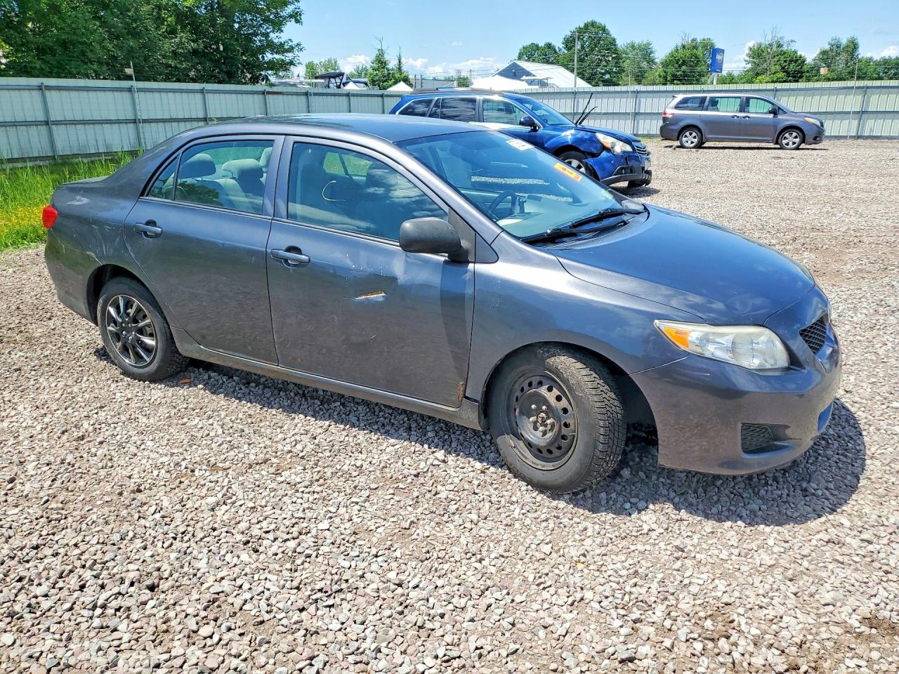 2009 Toyota Corolla Le Gray vin: JTDBL40E899047675