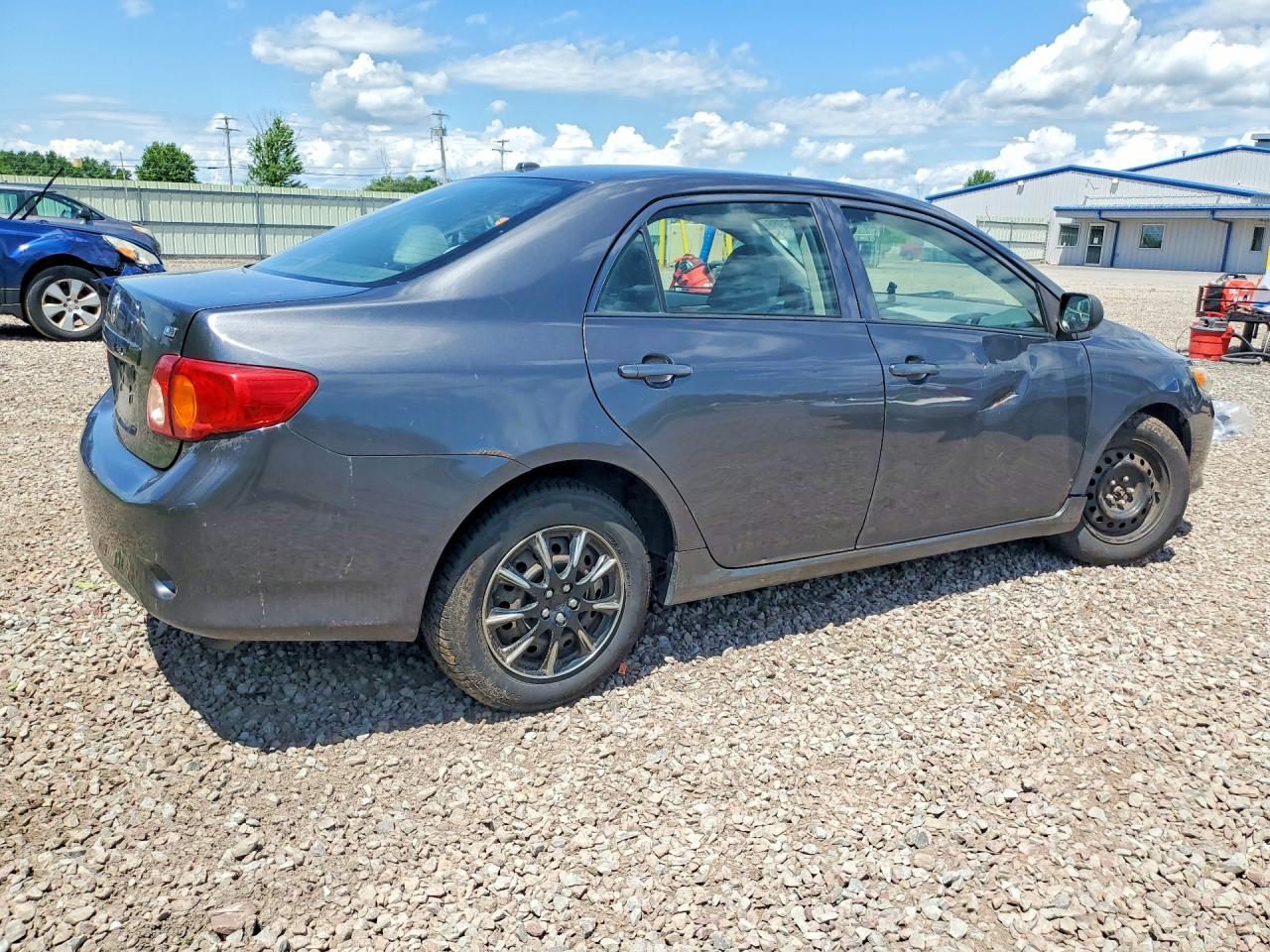 2009 Toyota Corolla Le Gray vin: JTDBL40E899047675