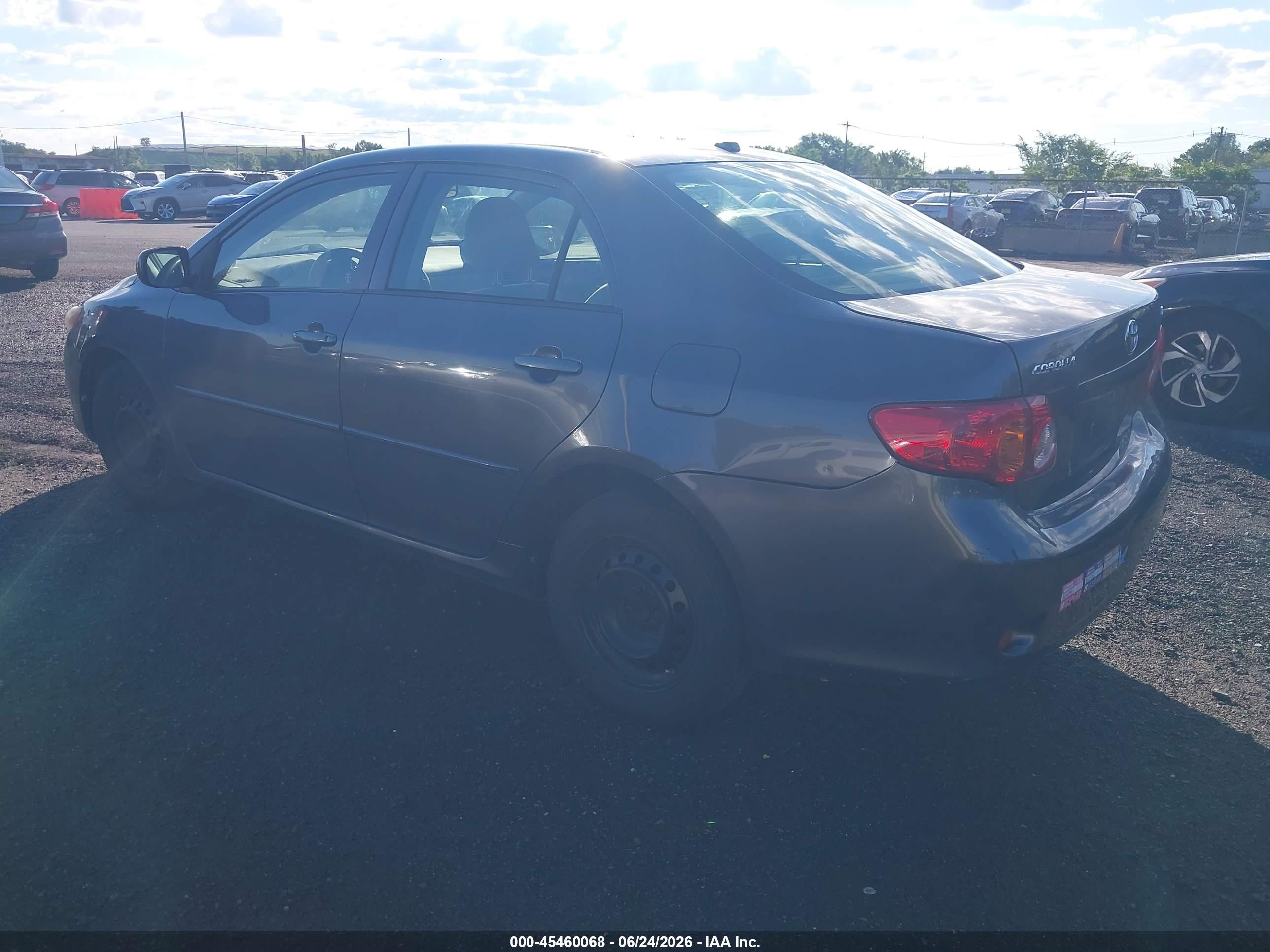 2009 Toyota Corolla Le Gray vin: JTDBL40E899050754