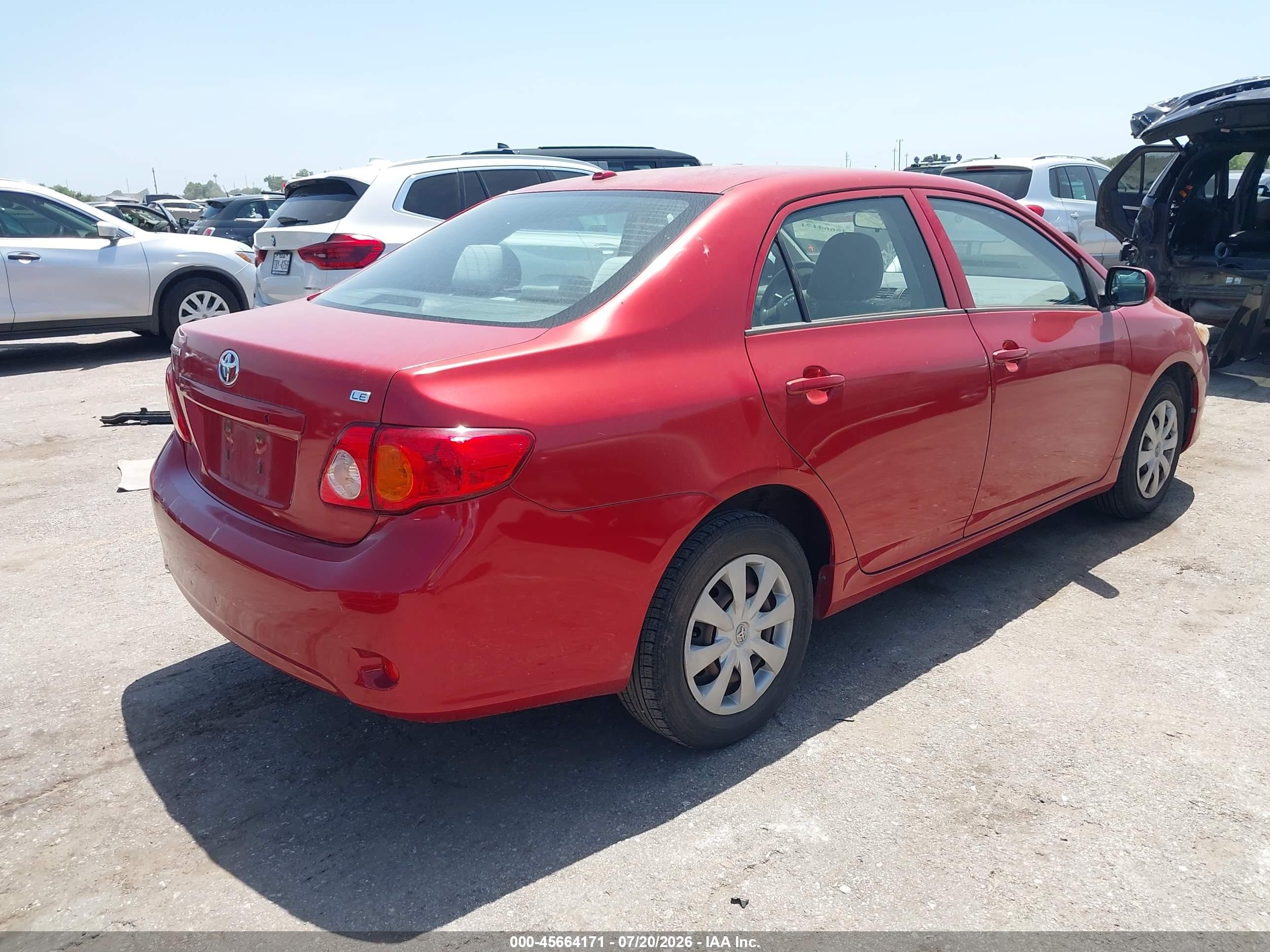 2009 Toyota Corolla Le Red vin: JTDBL40E89J007479
