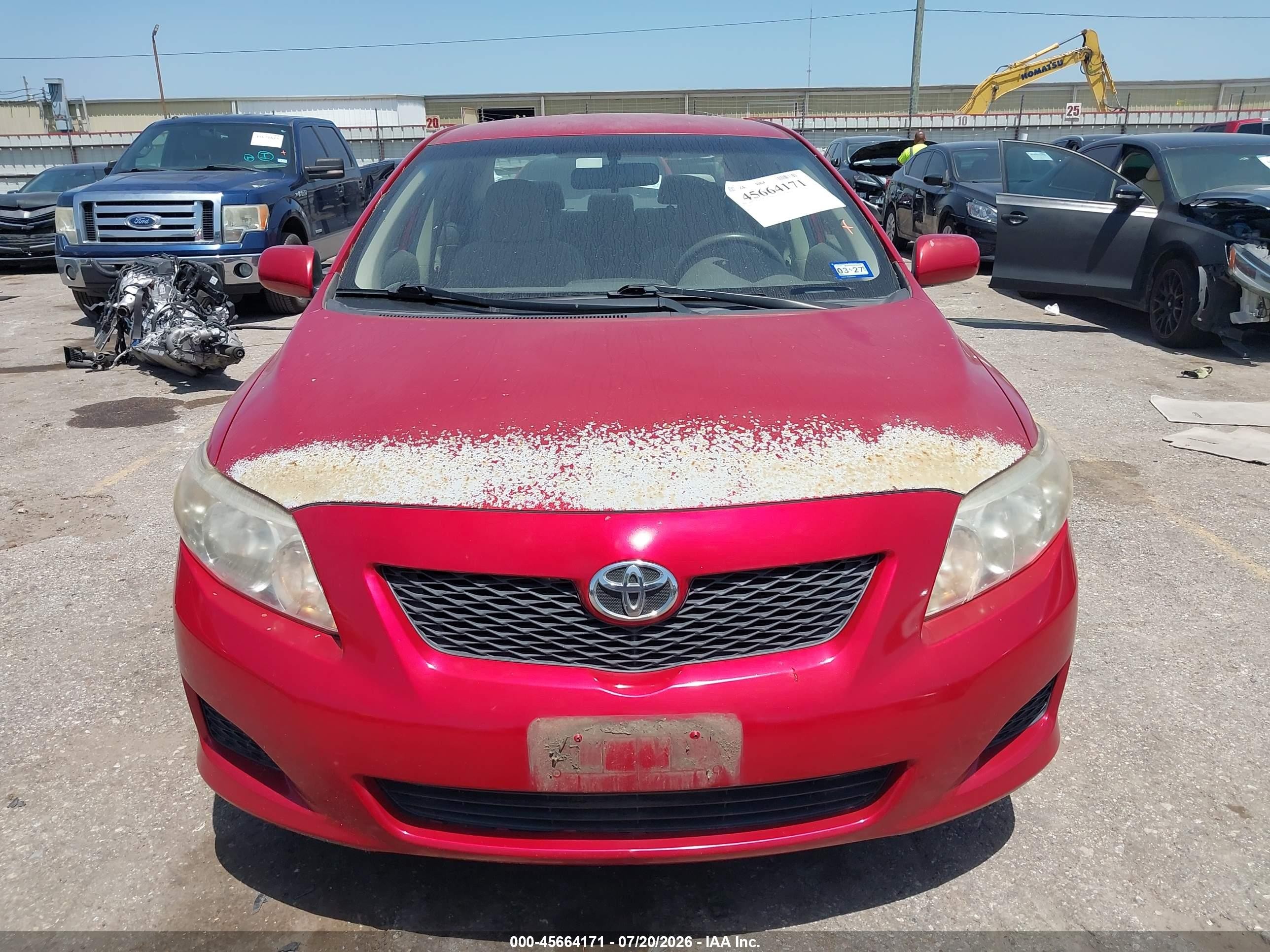 2009 Toyota Corolla Le Red vin: JTDBL40E89J007479