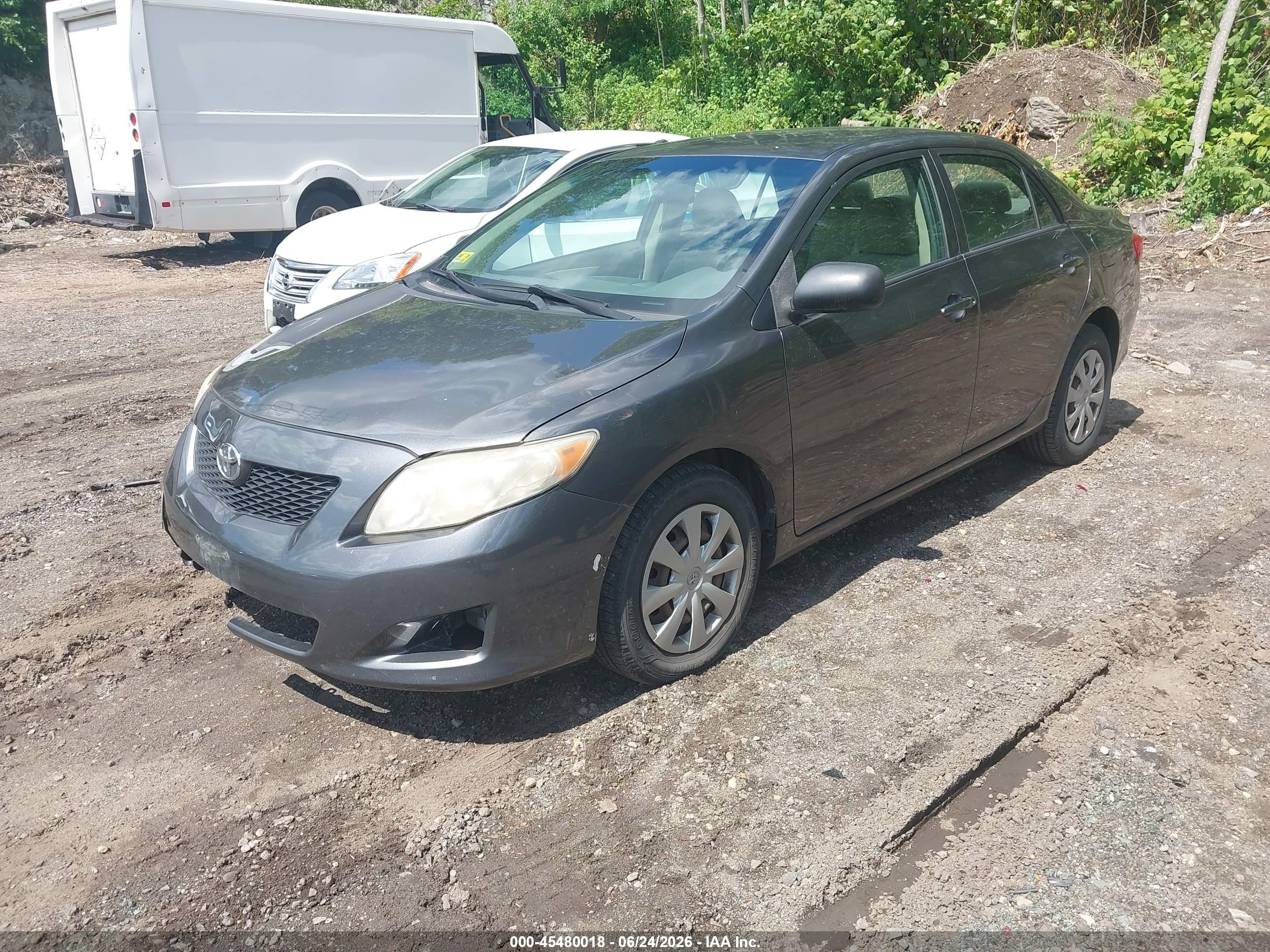 2009 Toyota Corolla Le Beige vin: JTDBL40E89J015338