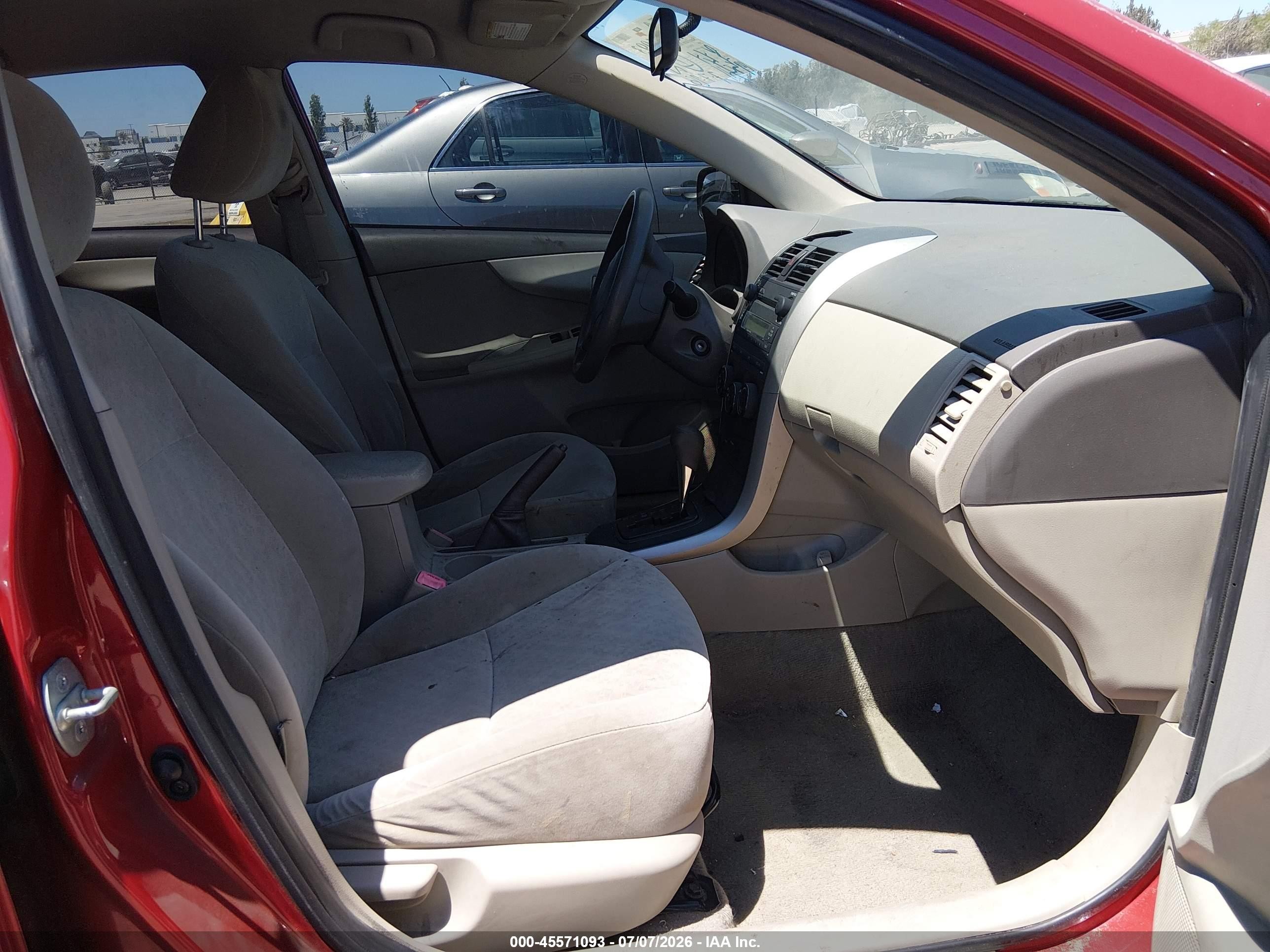 2009 Toyota Corolla Le Red vin: JTDBL40E89J033712