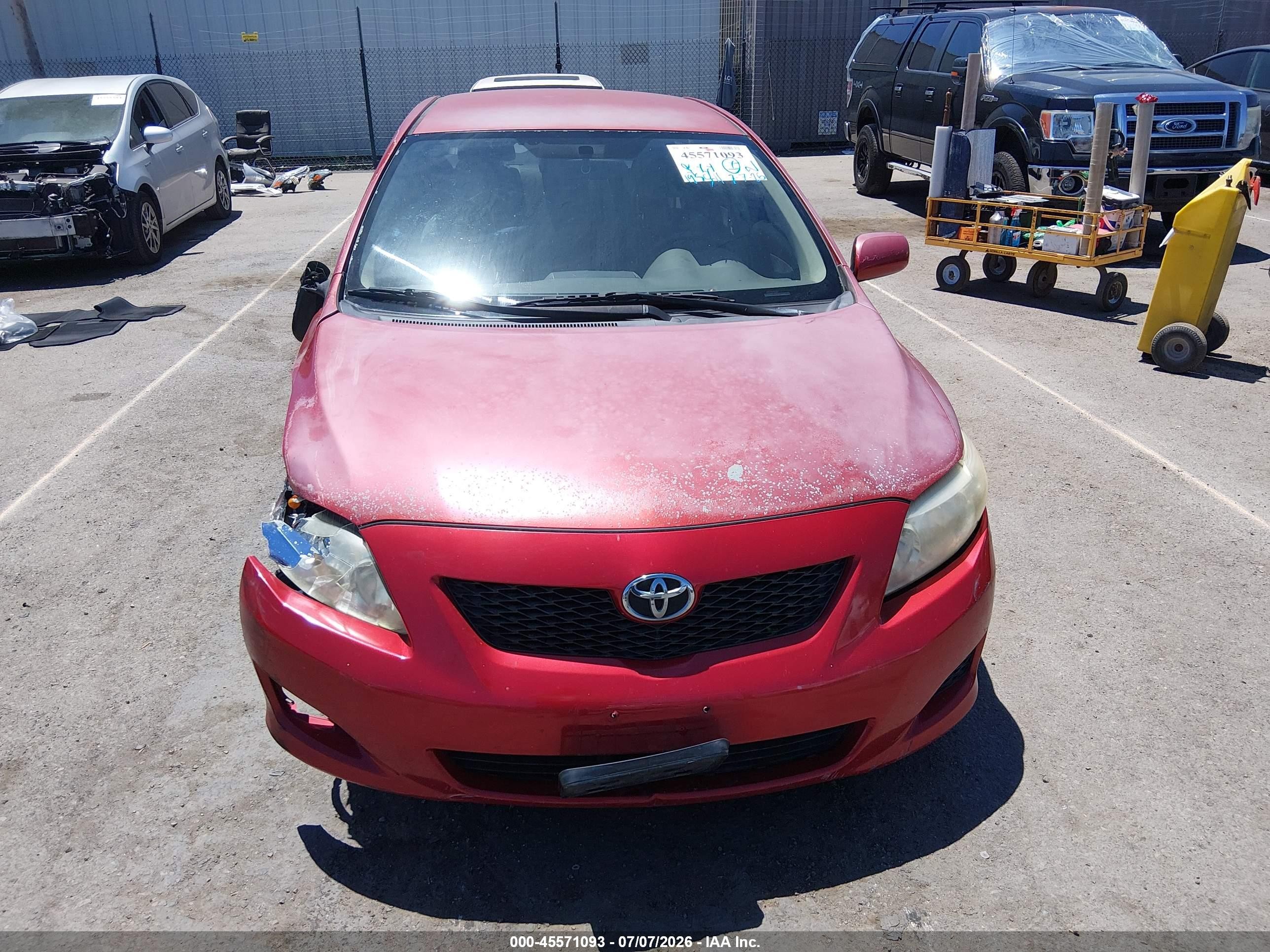 2009 Toyota Corolla Le Red vin: JTDBL40E89J033712