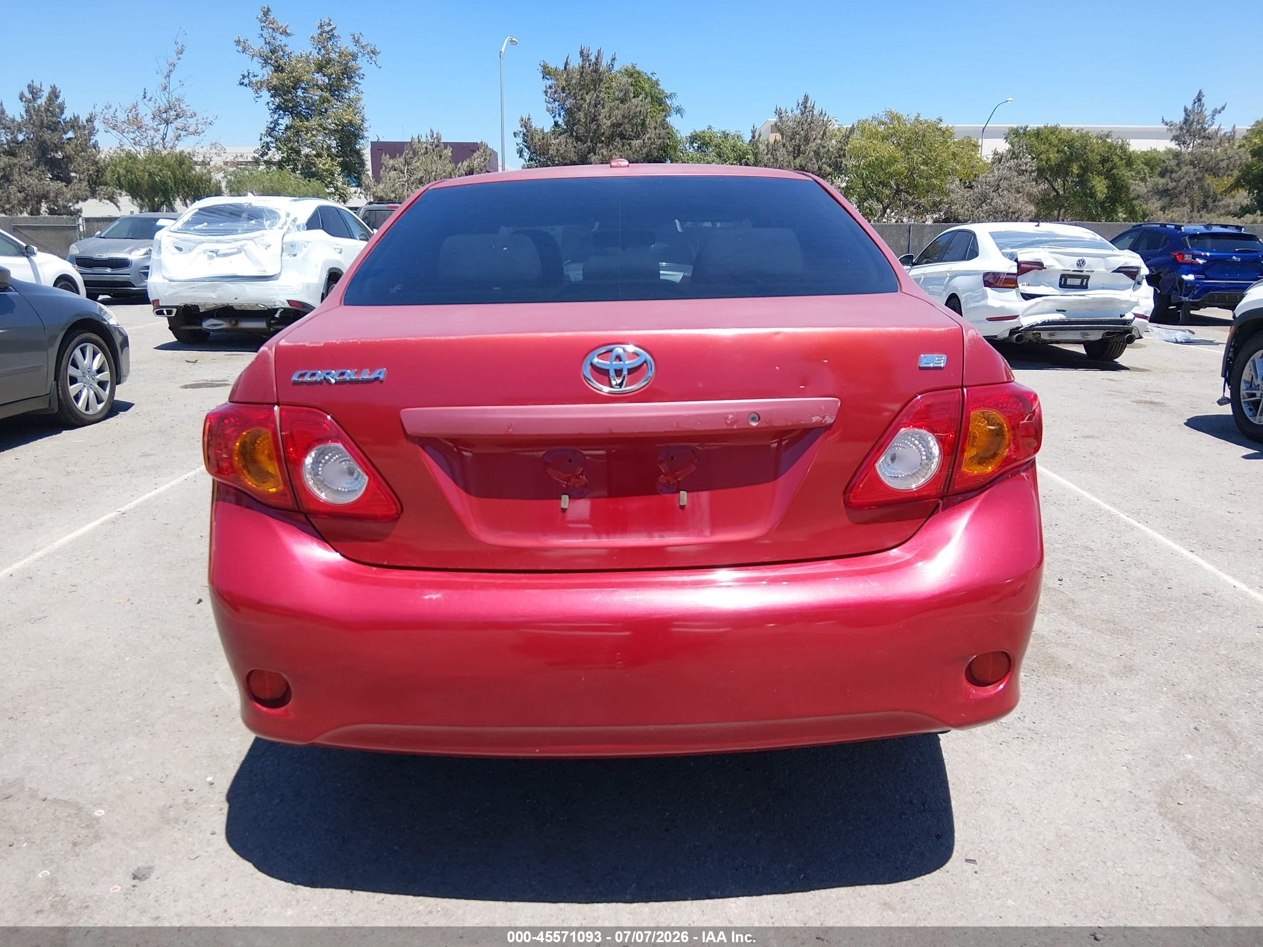 2009 Toyota Corolla Le Red vin: JTDBL40E89J033712
