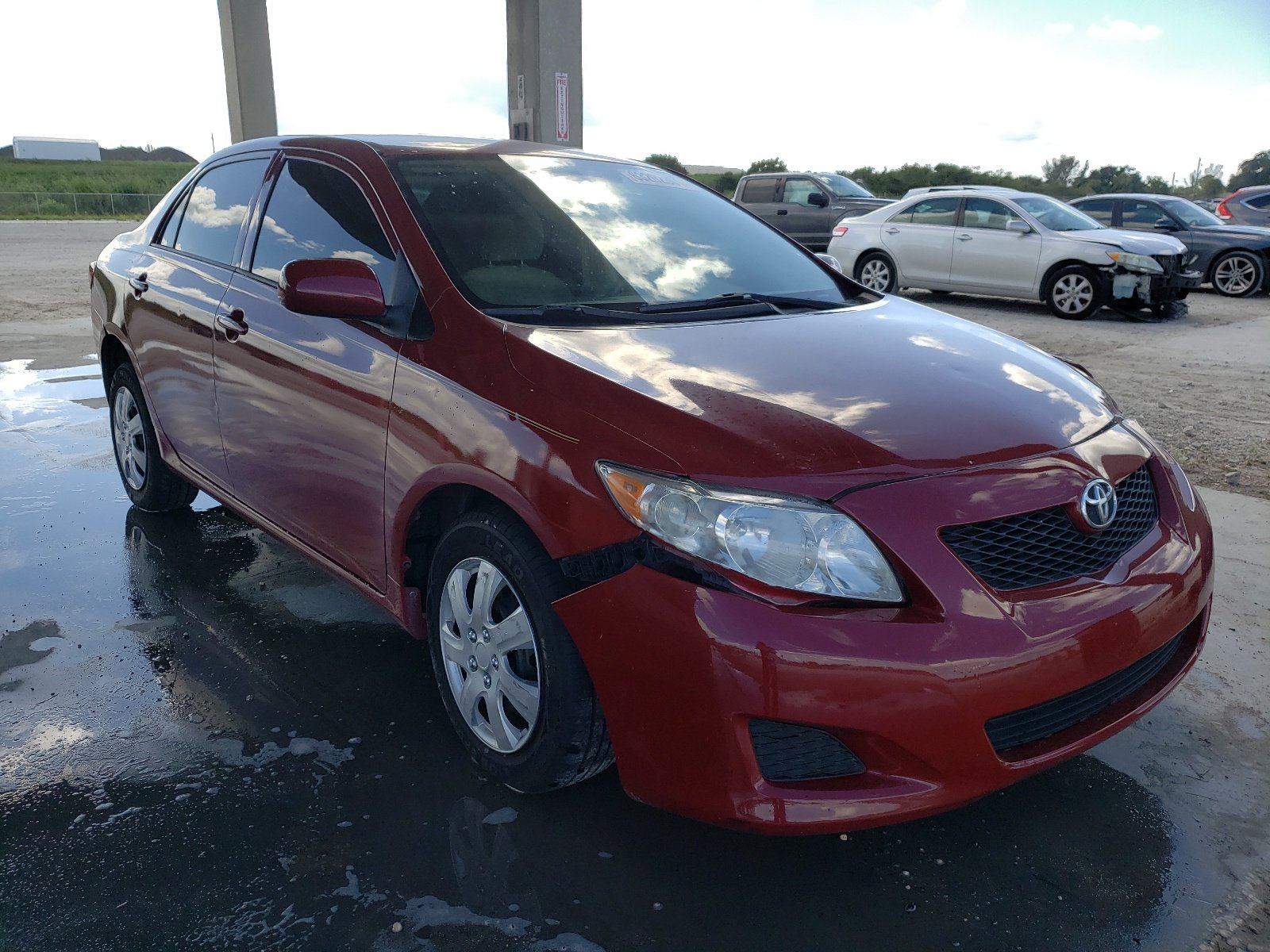 2009 Toyota Corolla Le Burgundy vin: JTDBL40E999027855