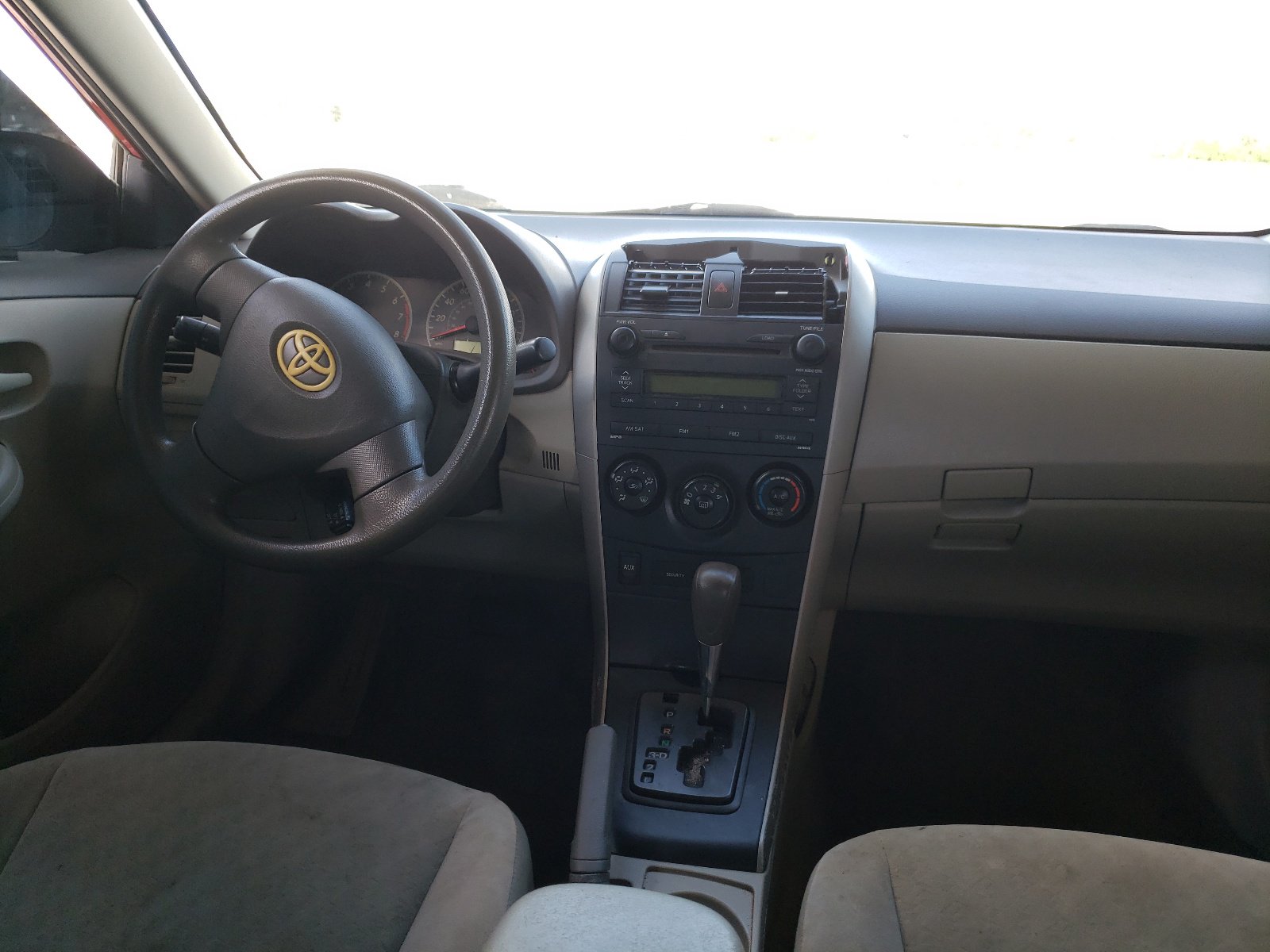 2009 Toyota Corolla Le Burgundy vin: JTDBL40E999027855