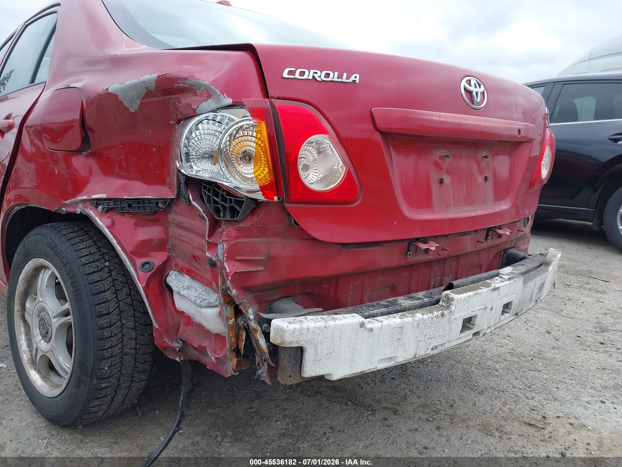 2009 Toyota Corolla Le Red vin: JTDBL40E999029041