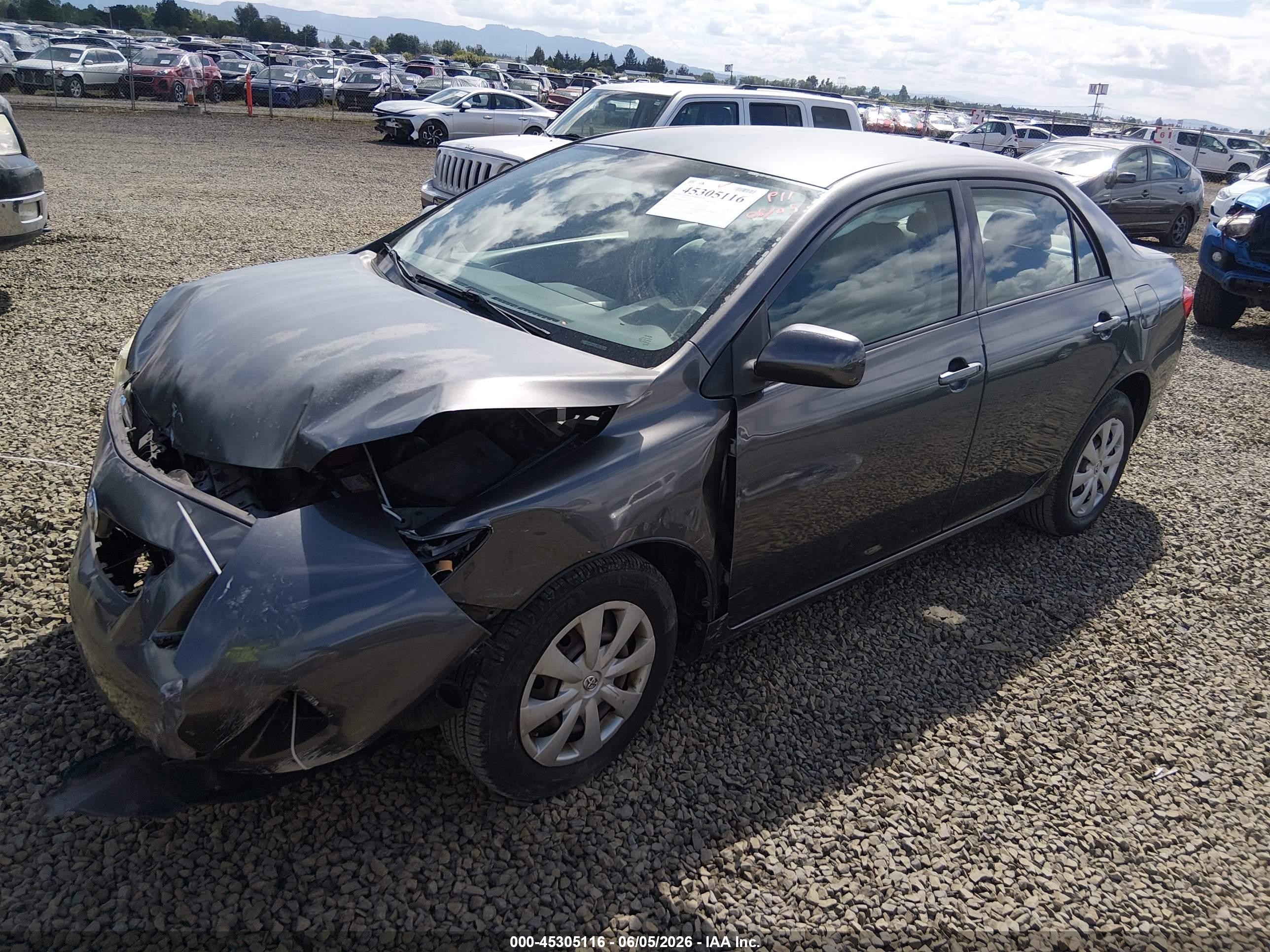 2009 Toyota Corolla Le Gray vin: JTDBL40E999068213