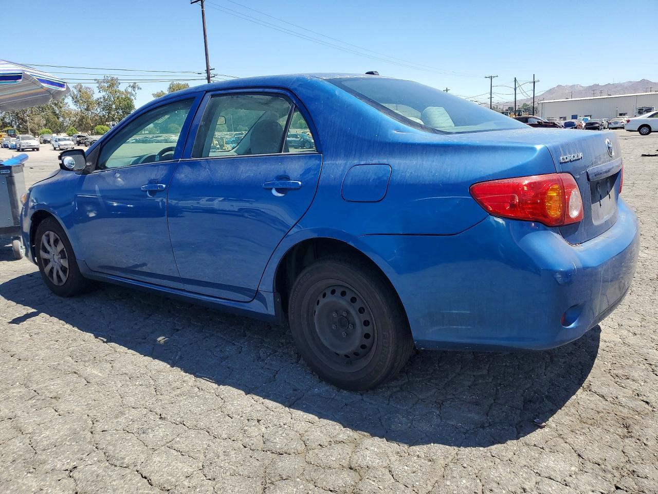 2009 Toyota Corolla Le Синий vin: JTDBL40E999085903