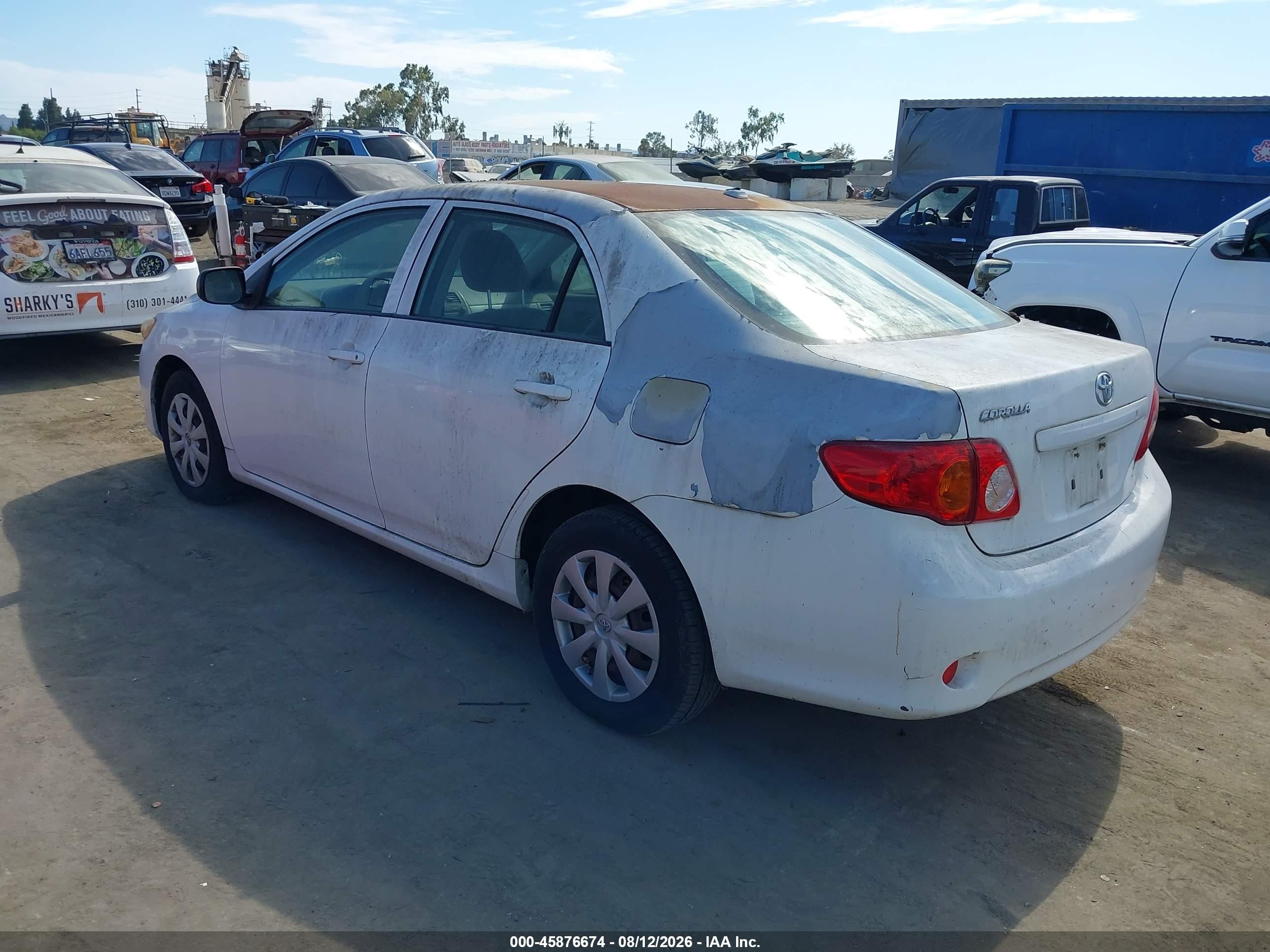 2009 Toyota Corolla Белый vin: JTDBL40E99J030706