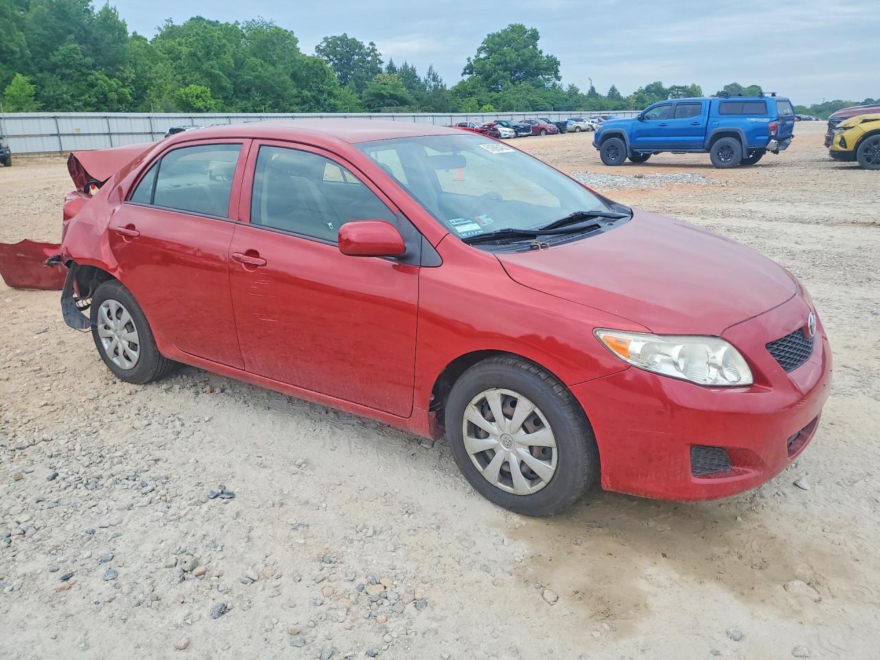 2009 Toyota Corolla Le Red vin: JTDBL40EX99031347