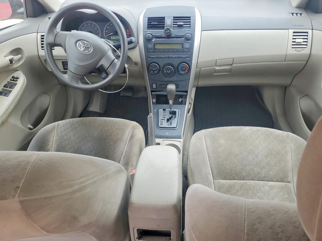 2009 Toyota Corolla Le Red vin: JTDBL40EX99031347