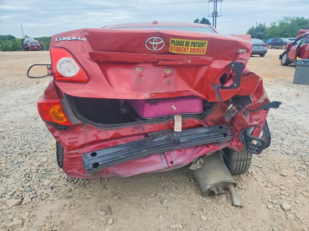 2009 Toyota Corolla Le Red vin: JTDBL40EX99031347