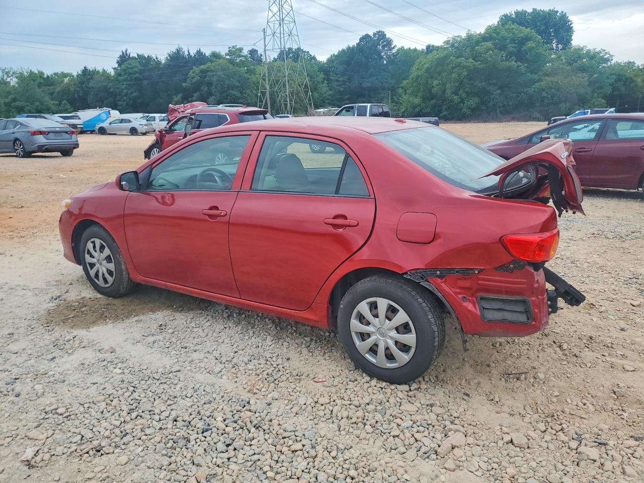 2009 Toyota Corolla Le Red vin: JTDBL40EX99031347