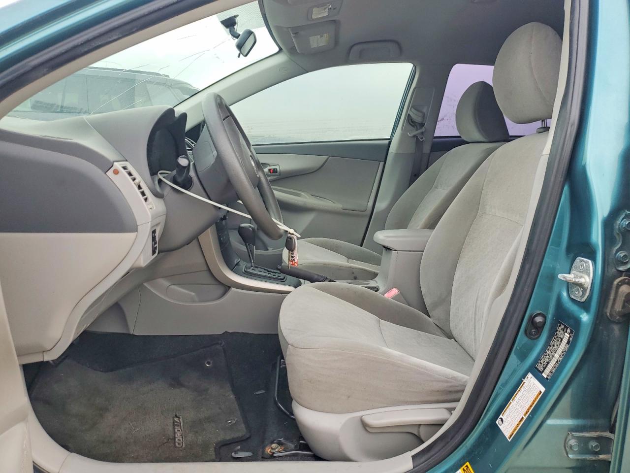 2009 Toyota Corolla Base Teal vin: JTDBL40EX99044910