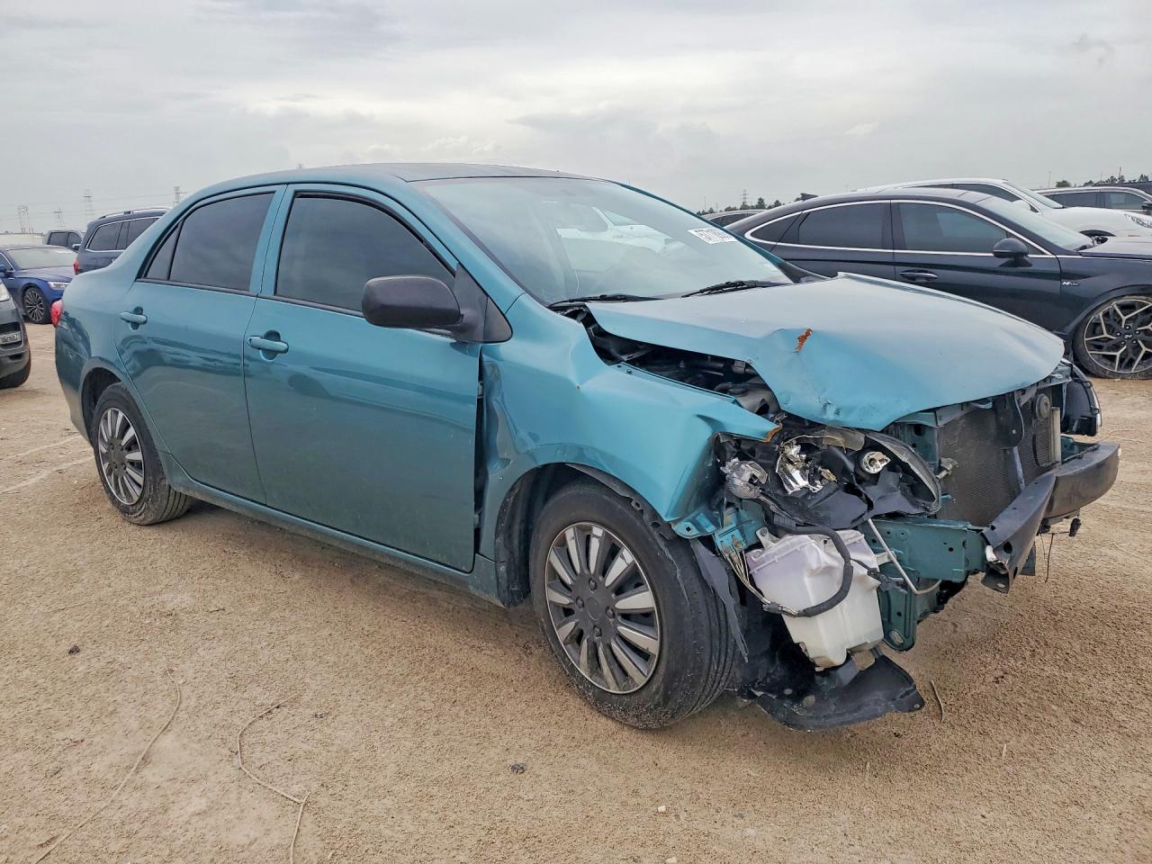 2009 Toyota Corolla Base Teal vin: JTDBL40EX99044910