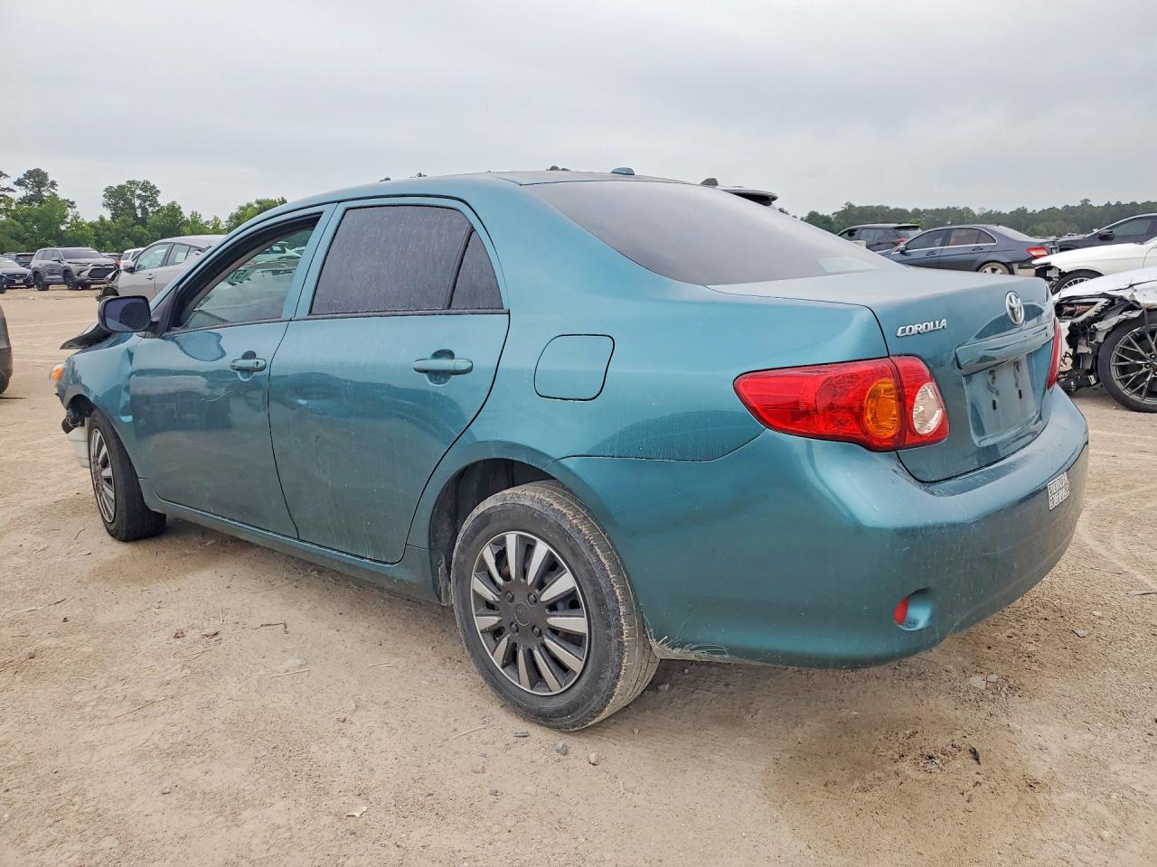 2009 Toyota Corolla Base Teal vin: JTDBL40EX99044910