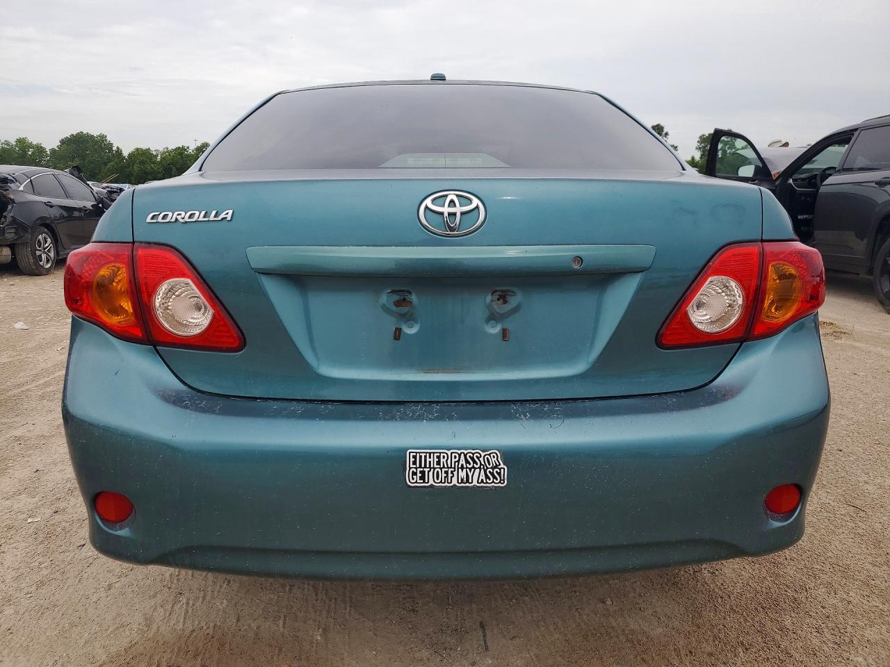 2009 Toyota Corolla Base Teal vin: JTDBL40EX99044910