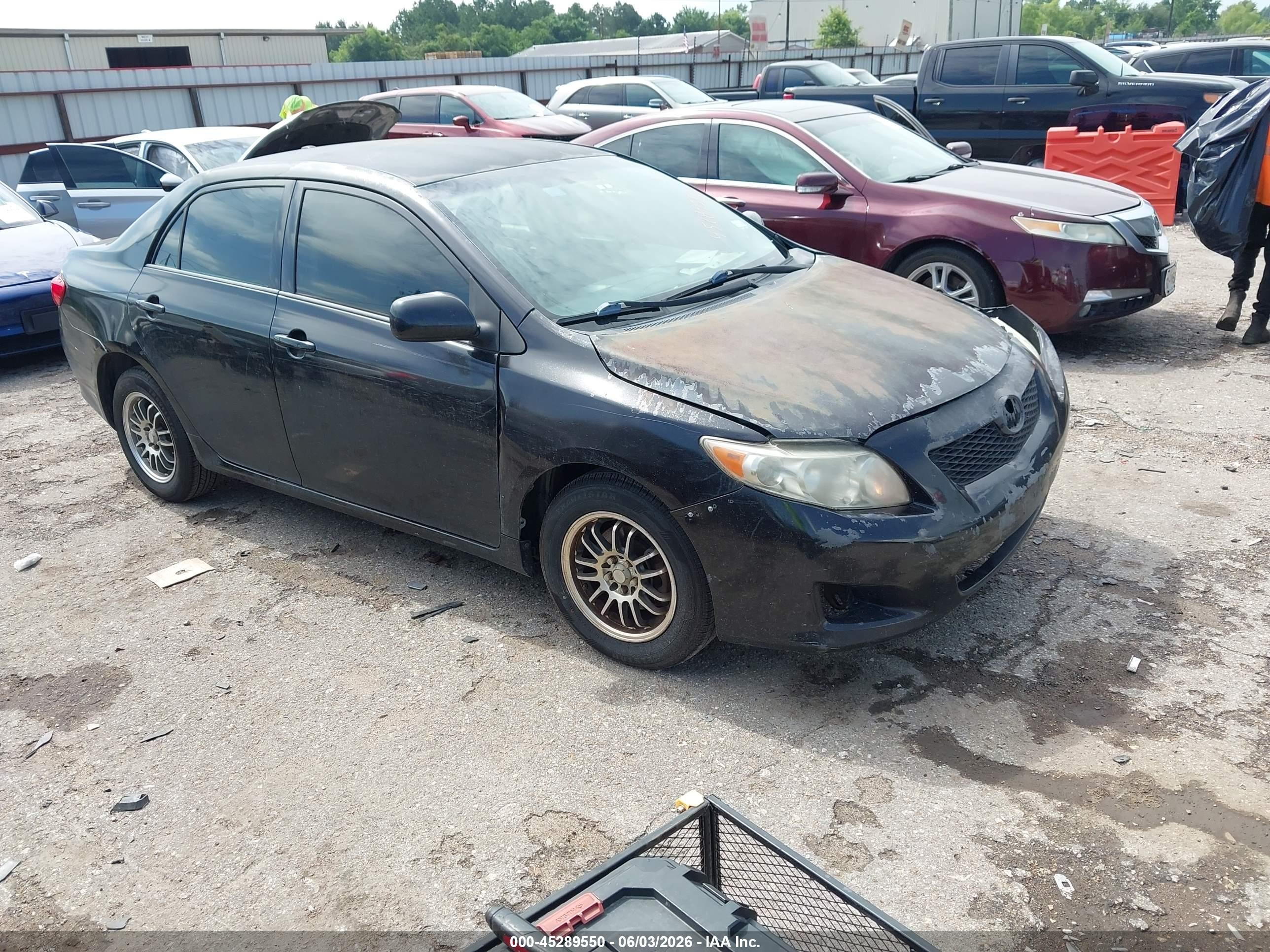 2009 Toyota Corolla Le Black vin: JTDBL40EX99048360