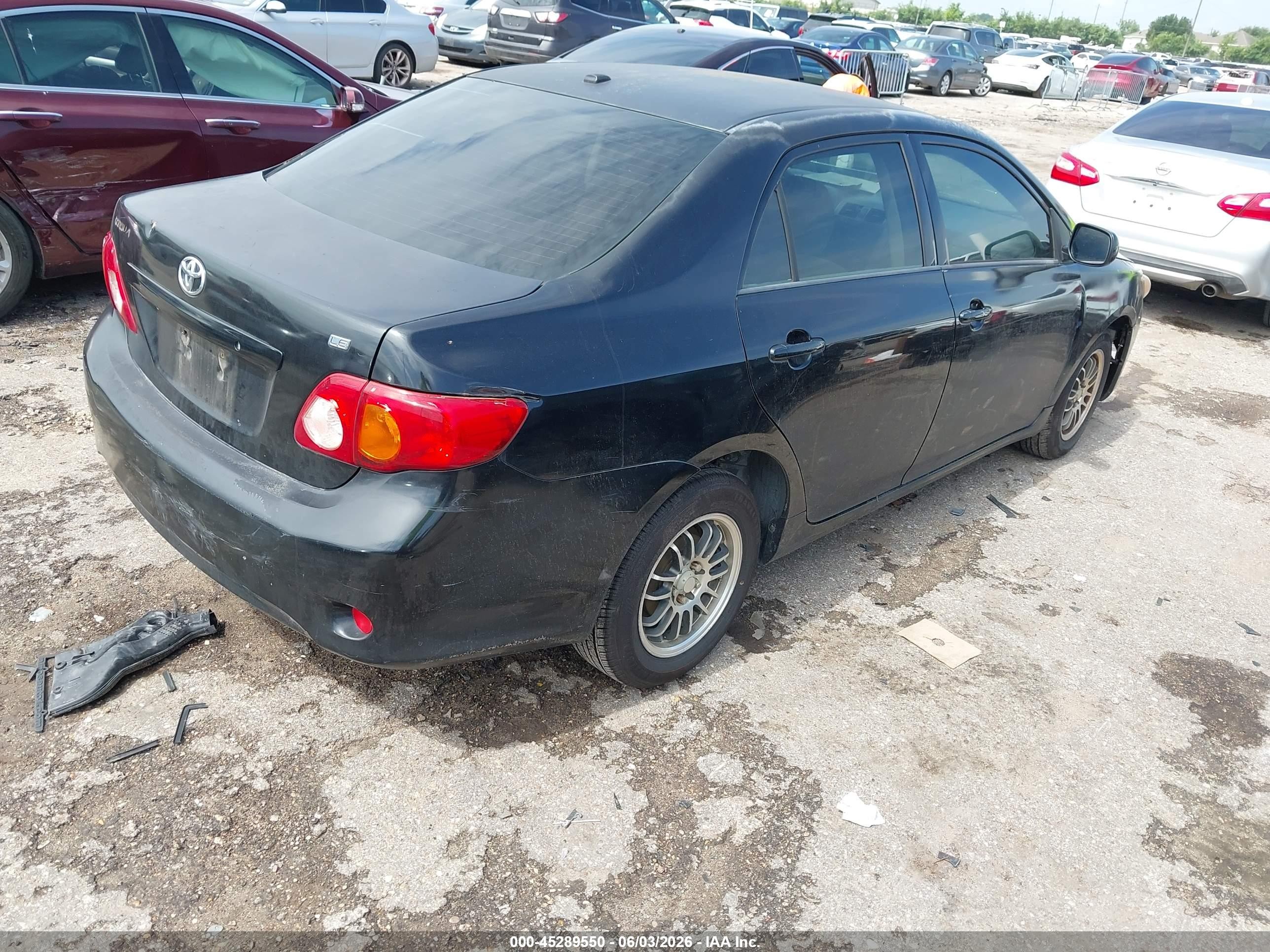 2009 Toyota Corolla Le Black vin: JTDBL40EX99048360