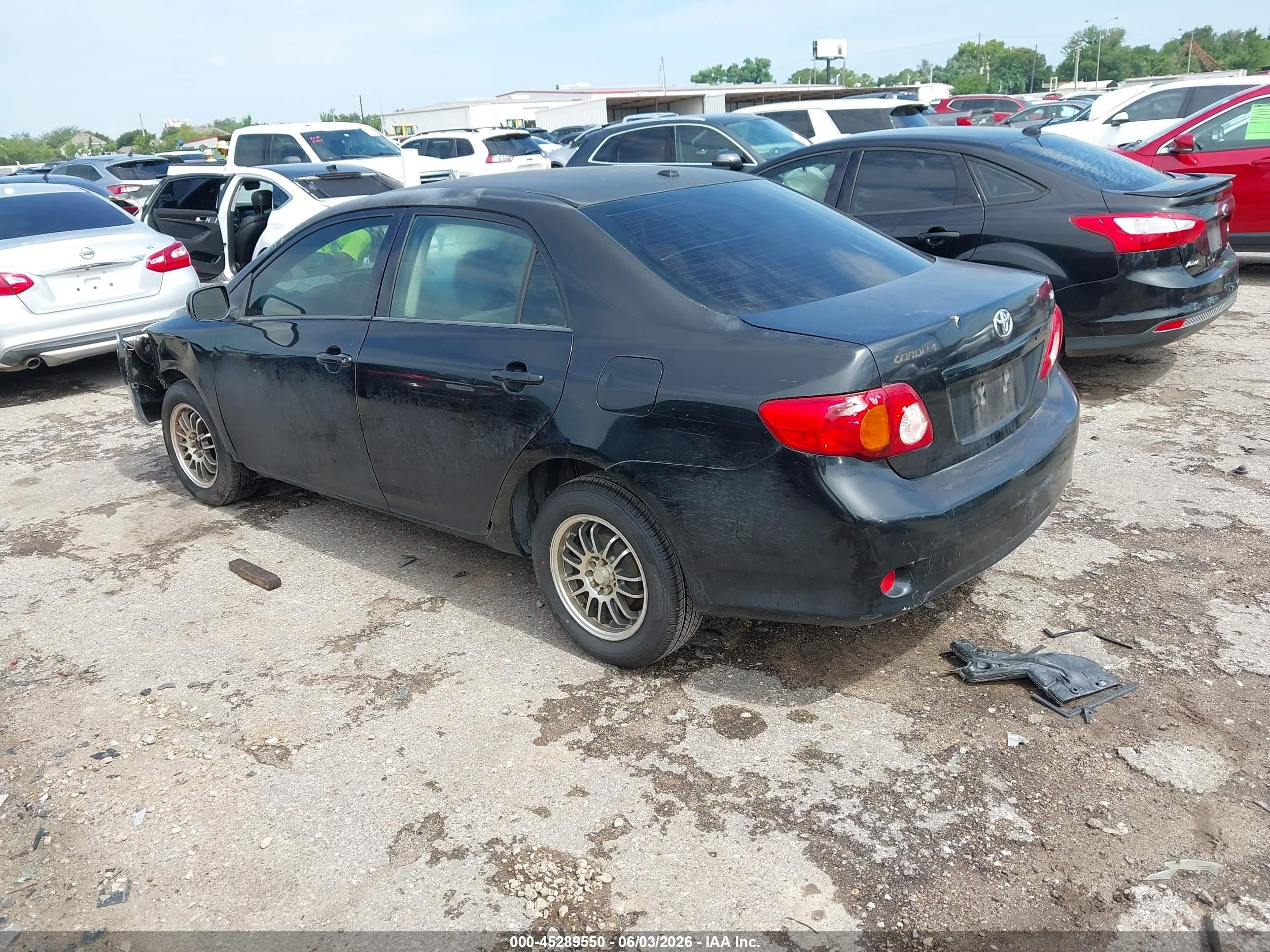 2009 Toyota Corolla Le Black vin: JTDBL40EX99048360
