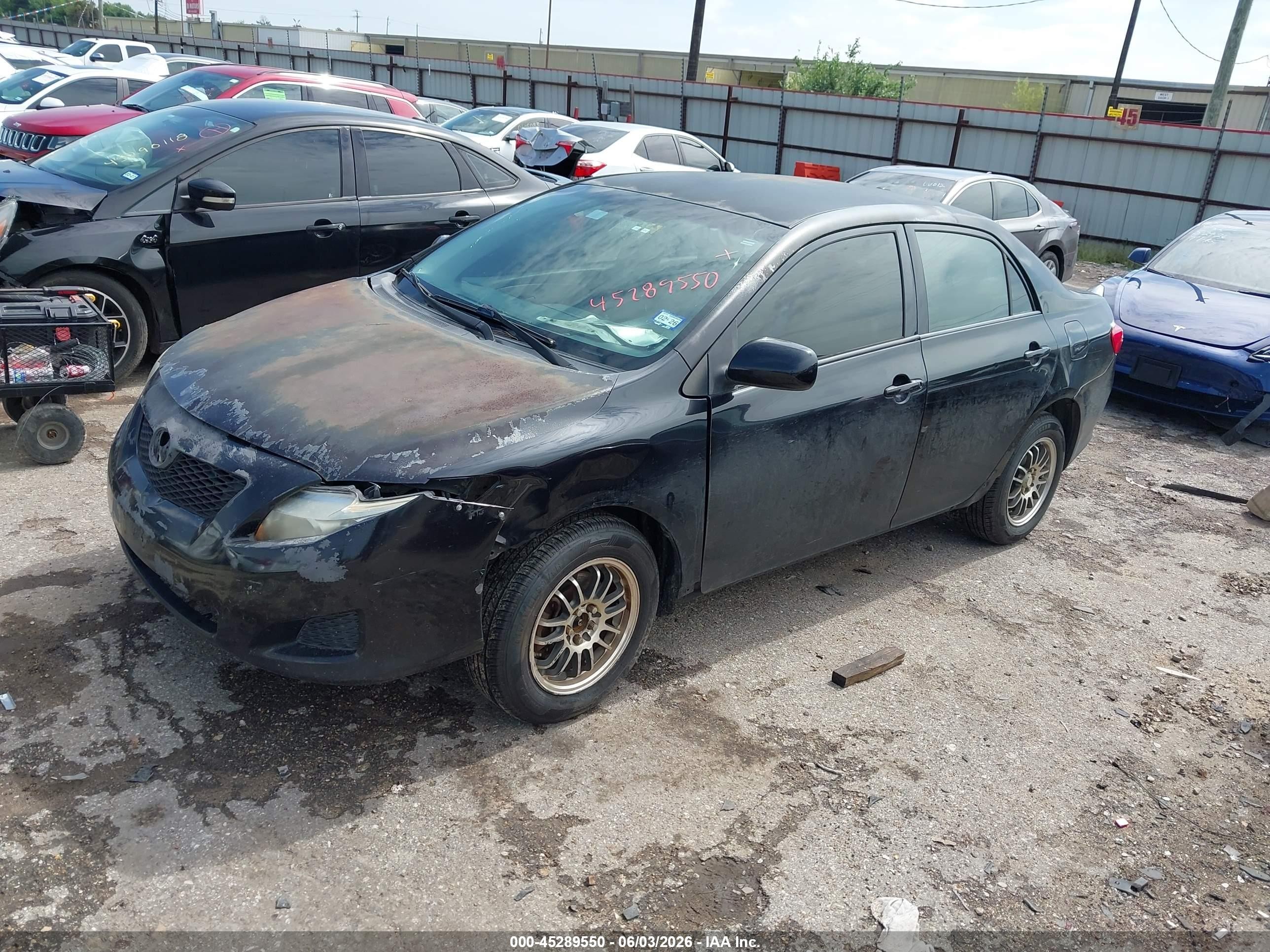 2009 Toyota Corolla Le Black vin: JTDBL40EX99048360