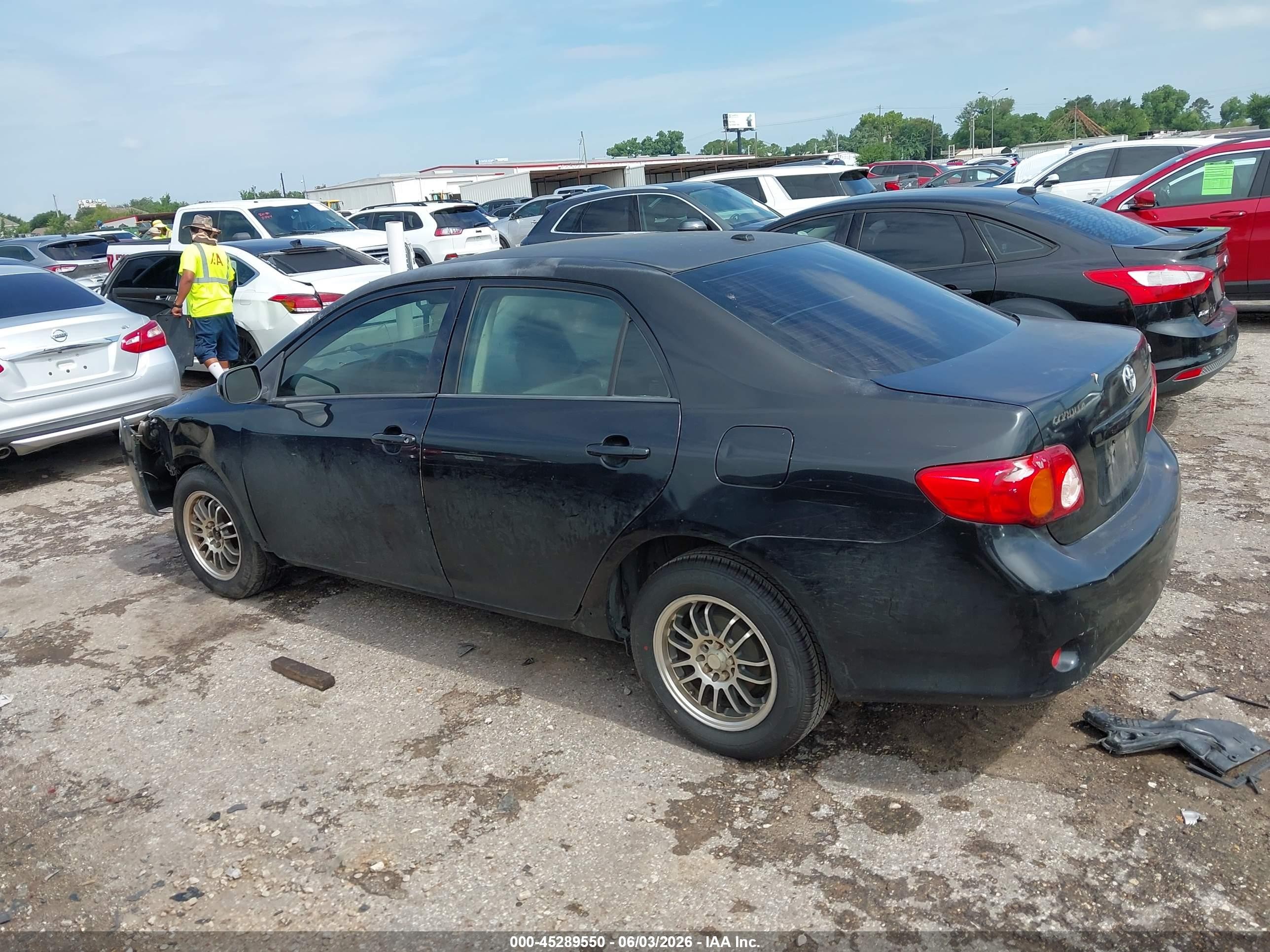 2009 Toyota Corolla Le Black vin: JTDBL40EX99048360