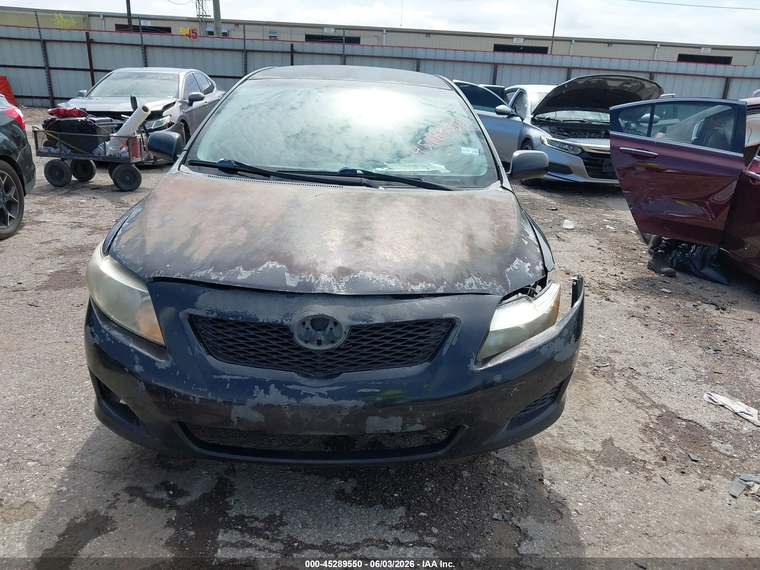 2009 Toyota Corolla Le Black vin: JTDBL40EX99048360