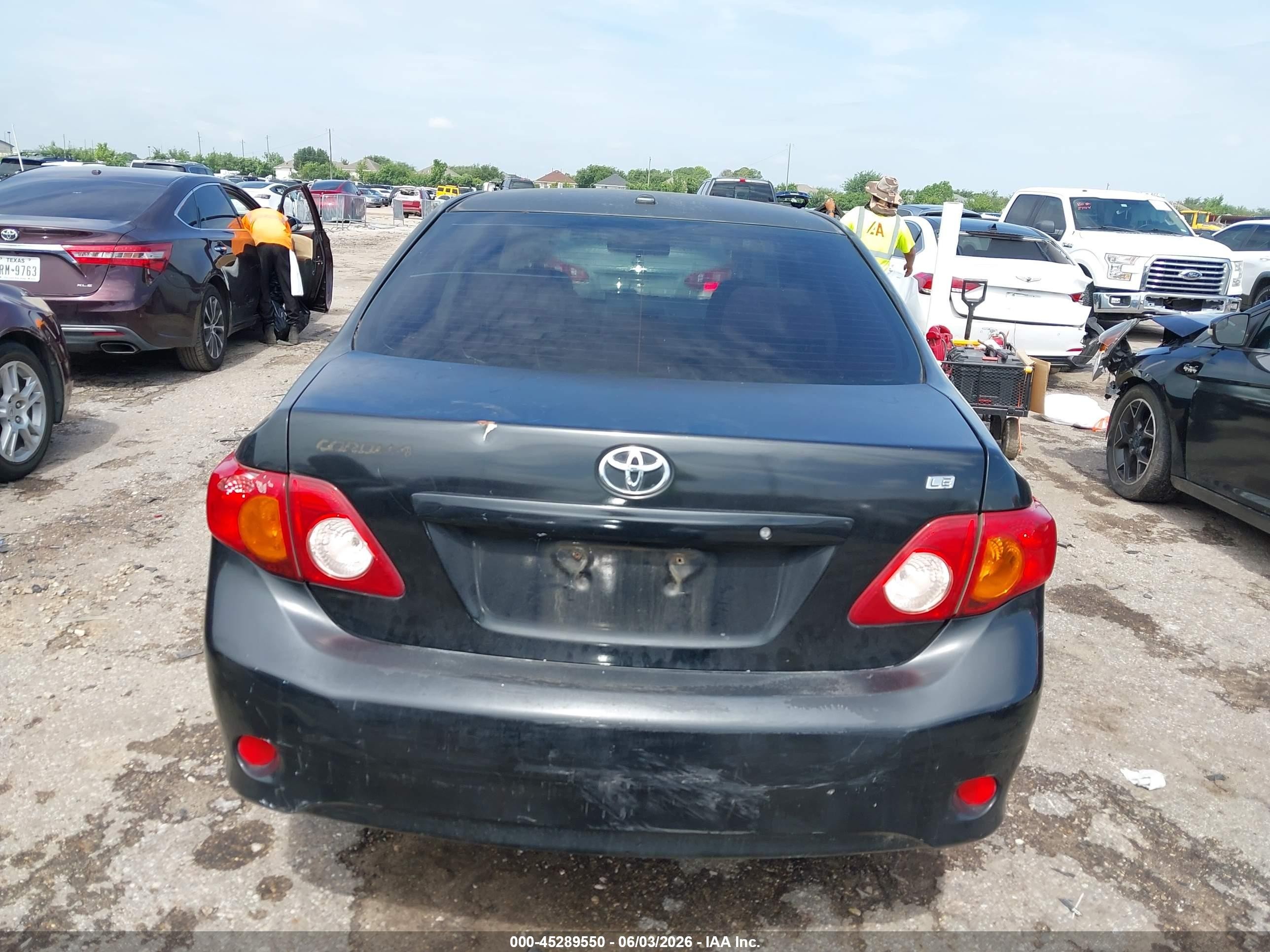 2009 Toyota Corolla Le Black vin: JTDBL40EX99048360