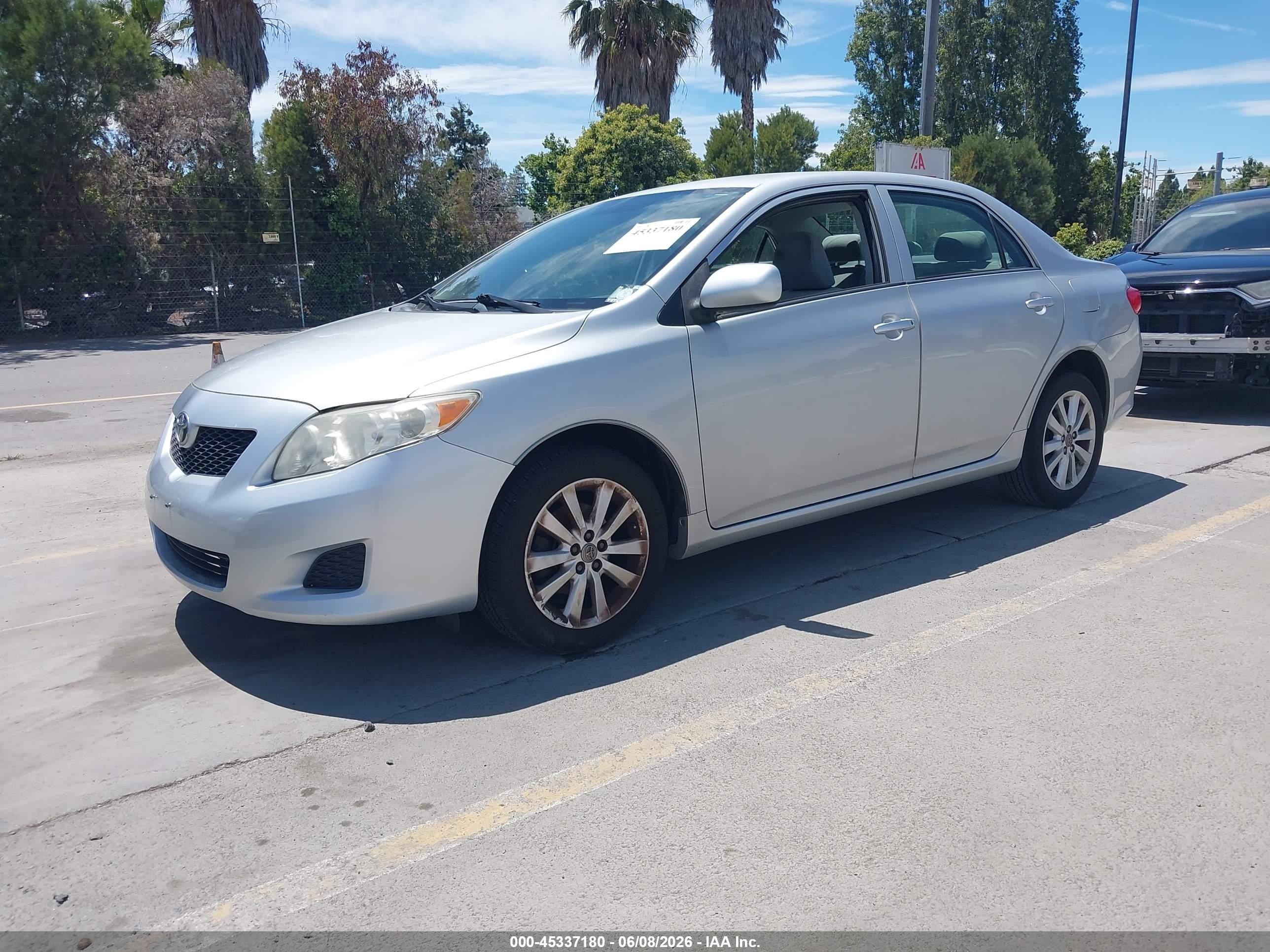 2009 Toyota Corolla Le Серебряный vin: JTDBL40EX99085148