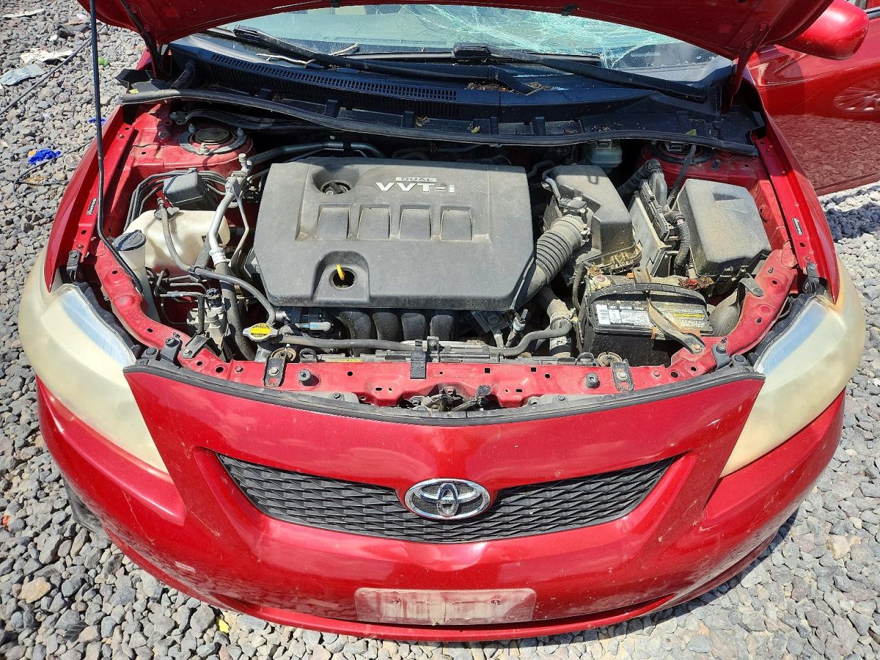 2009 Toyota Corolla Le Red vin: JTDBL40EX99093878