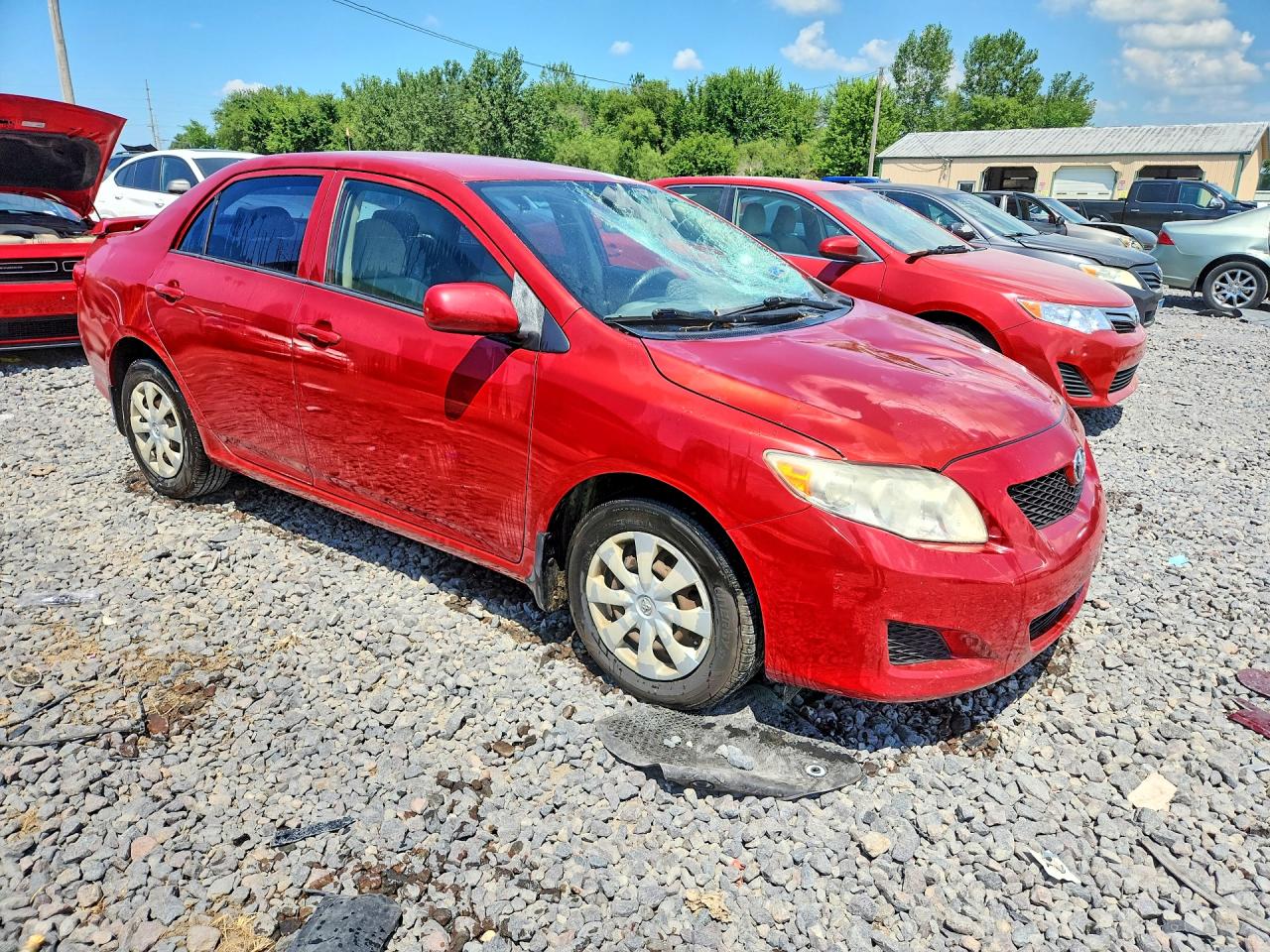 2009 Toyota Corolla Le Red vin: JTDBL40EX99093878
