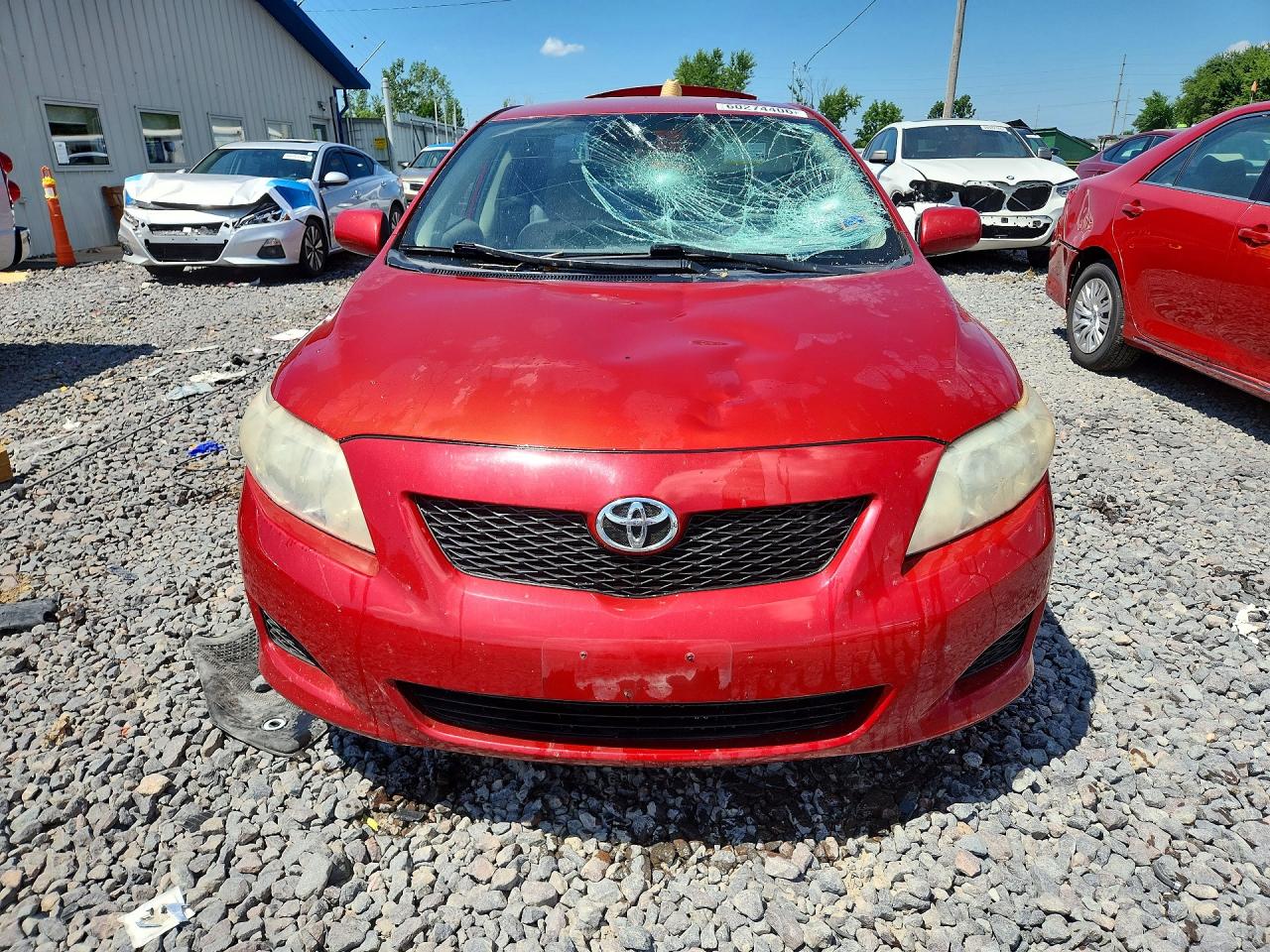 2009 Toyota Corolla Le Red vin: JTDBL40EX99093878