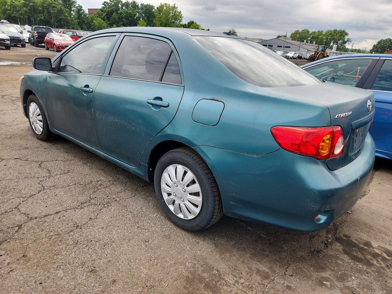 2009 Toyota Corolla Le Green vin: JTDBL40EX9J042864