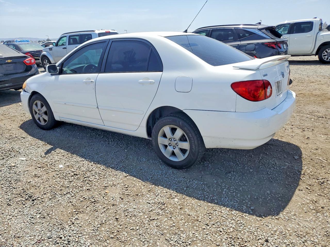 2003 Toyota Corolla Le White vin: JTDBR32E030021282