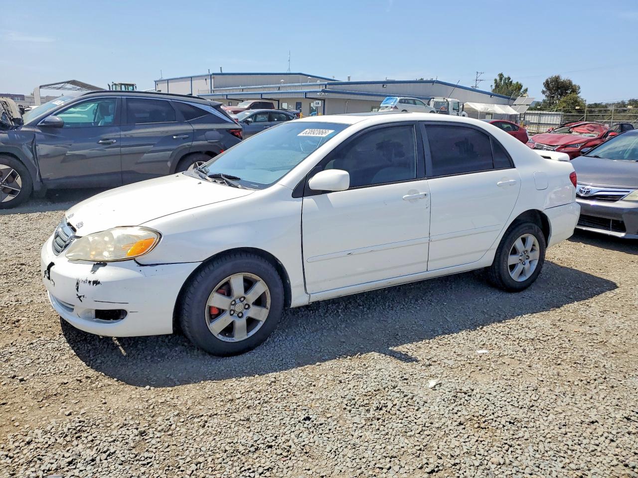 2003 Toyota Corolla Le White vin: JTDBR32E030021282