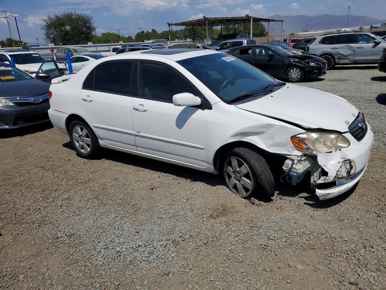 2003 Toyota Corolla Le White vin: JTDBR32E030021282